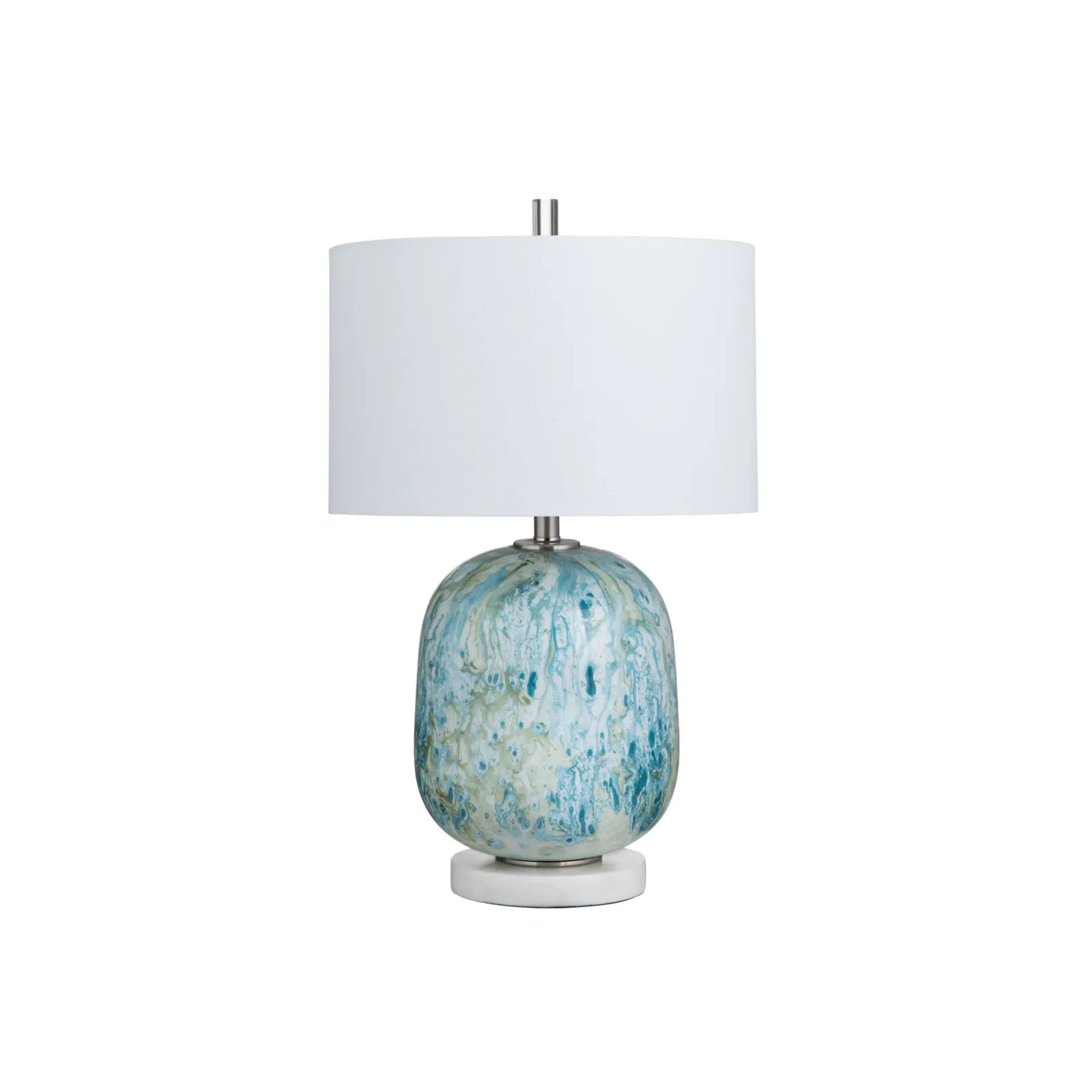 Table lamp with blue and white ceramic base and white drum shade.