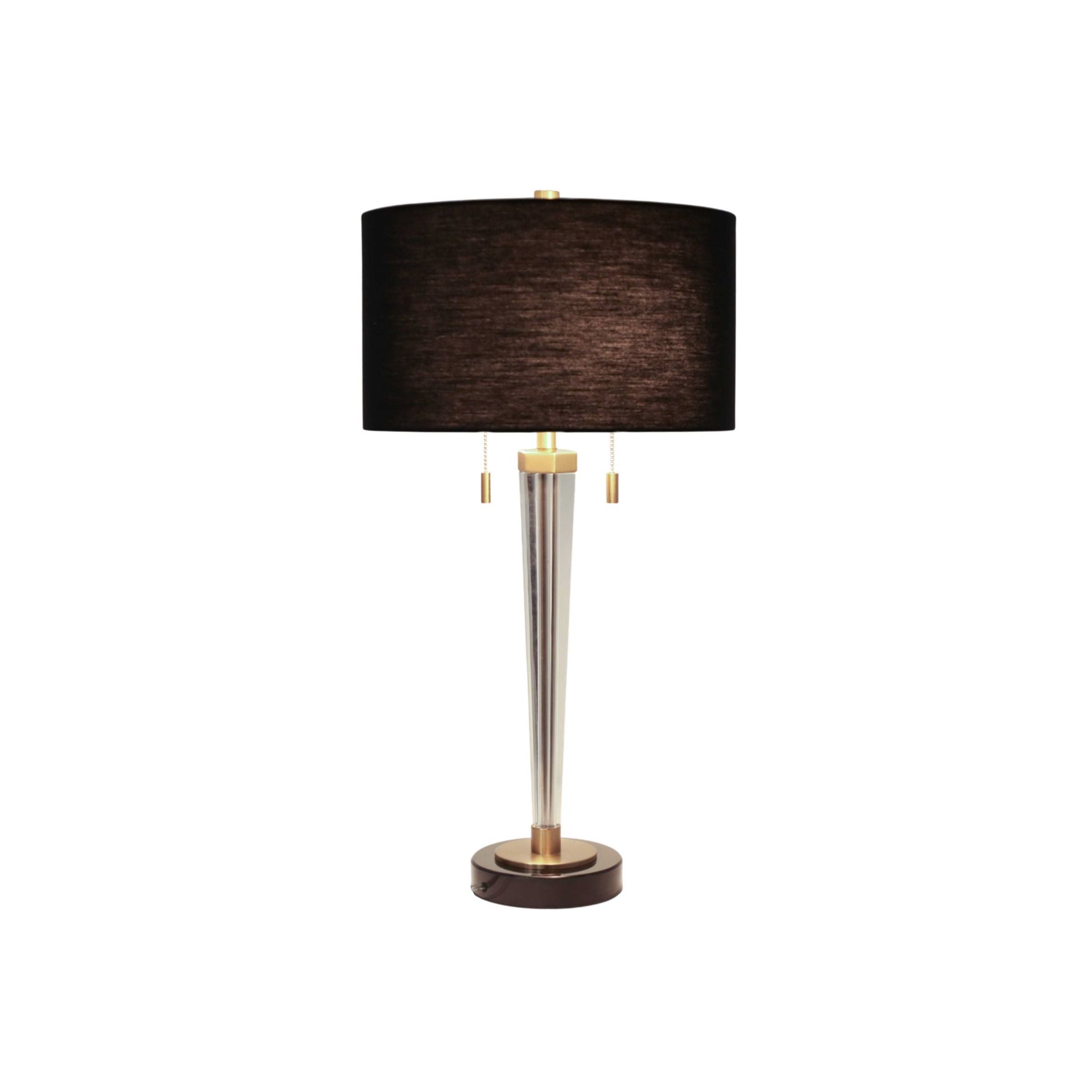Modern table lamp with a black shade and gold accents.