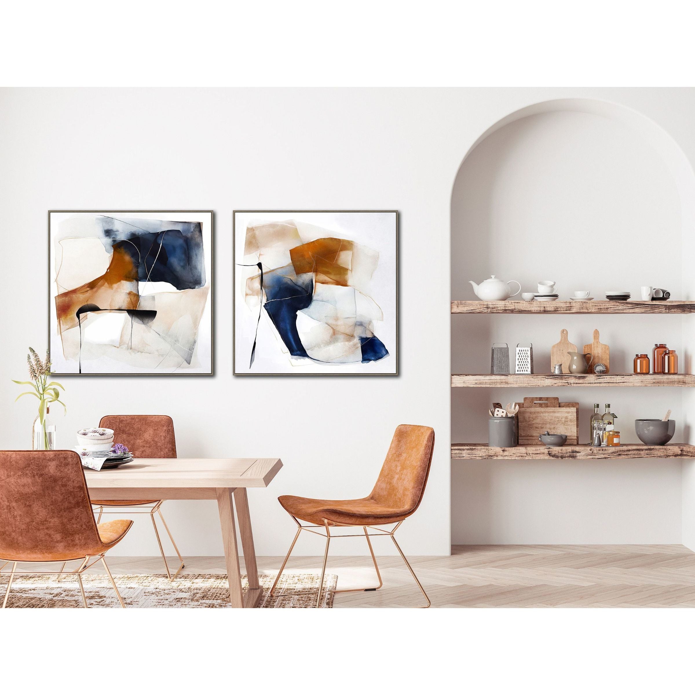 Modern dining room with two abstract paintings, wooden table, and open shelves.