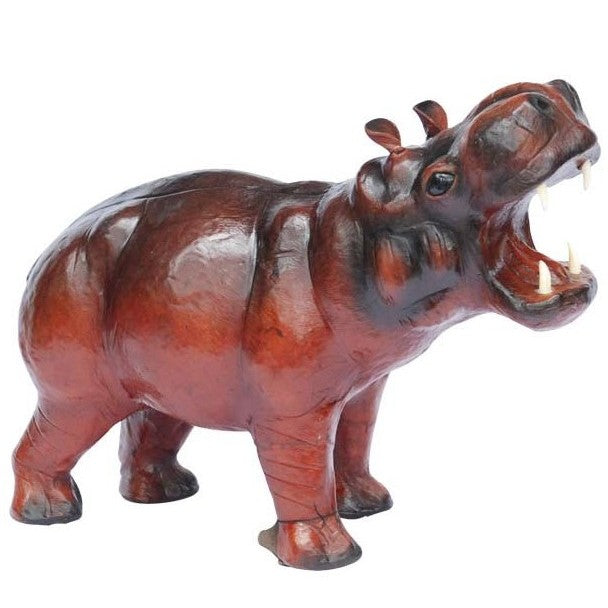 Wooden hippopotamus figurine with open mouth, showing teeth.
