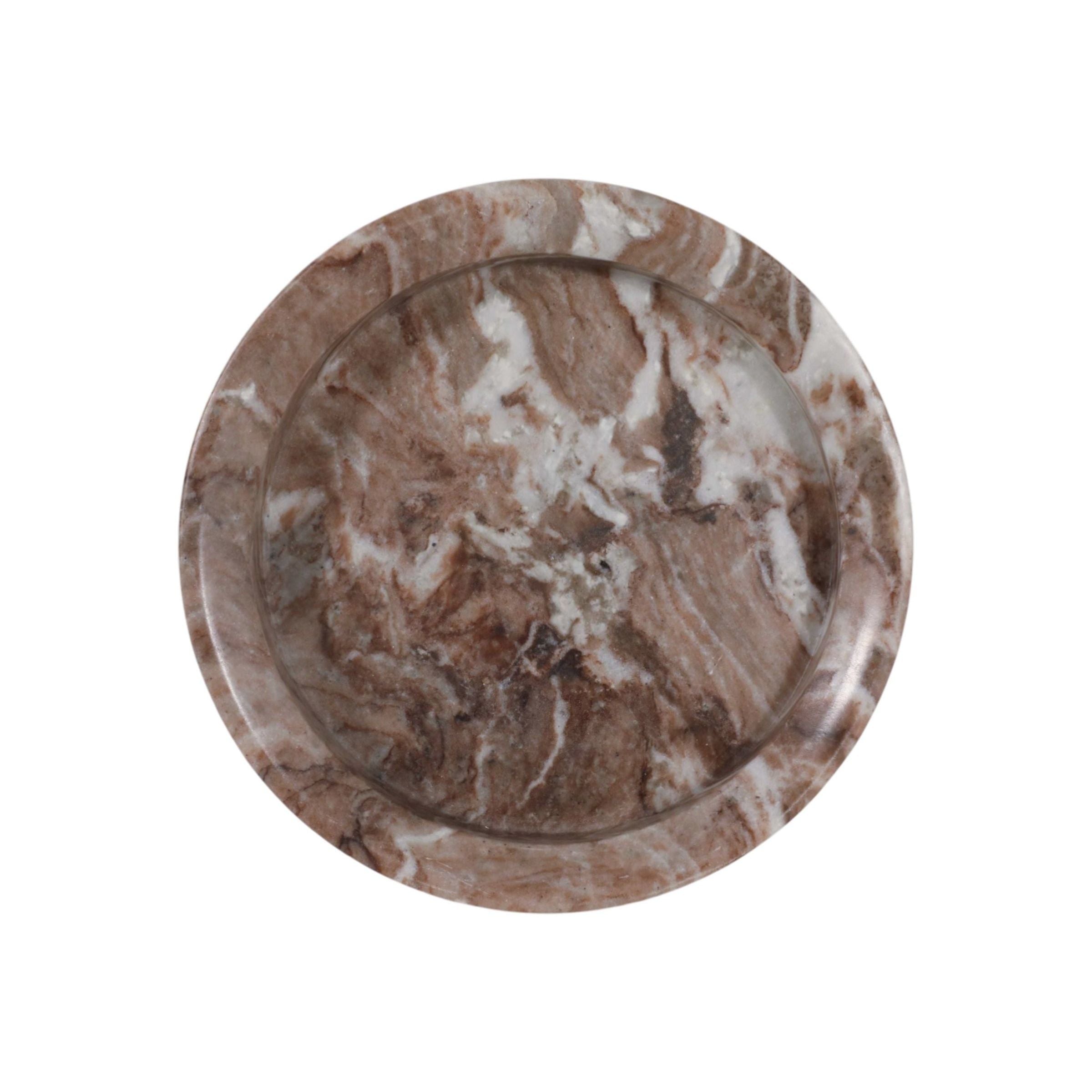Round plate with brown and white marble-like pattern.