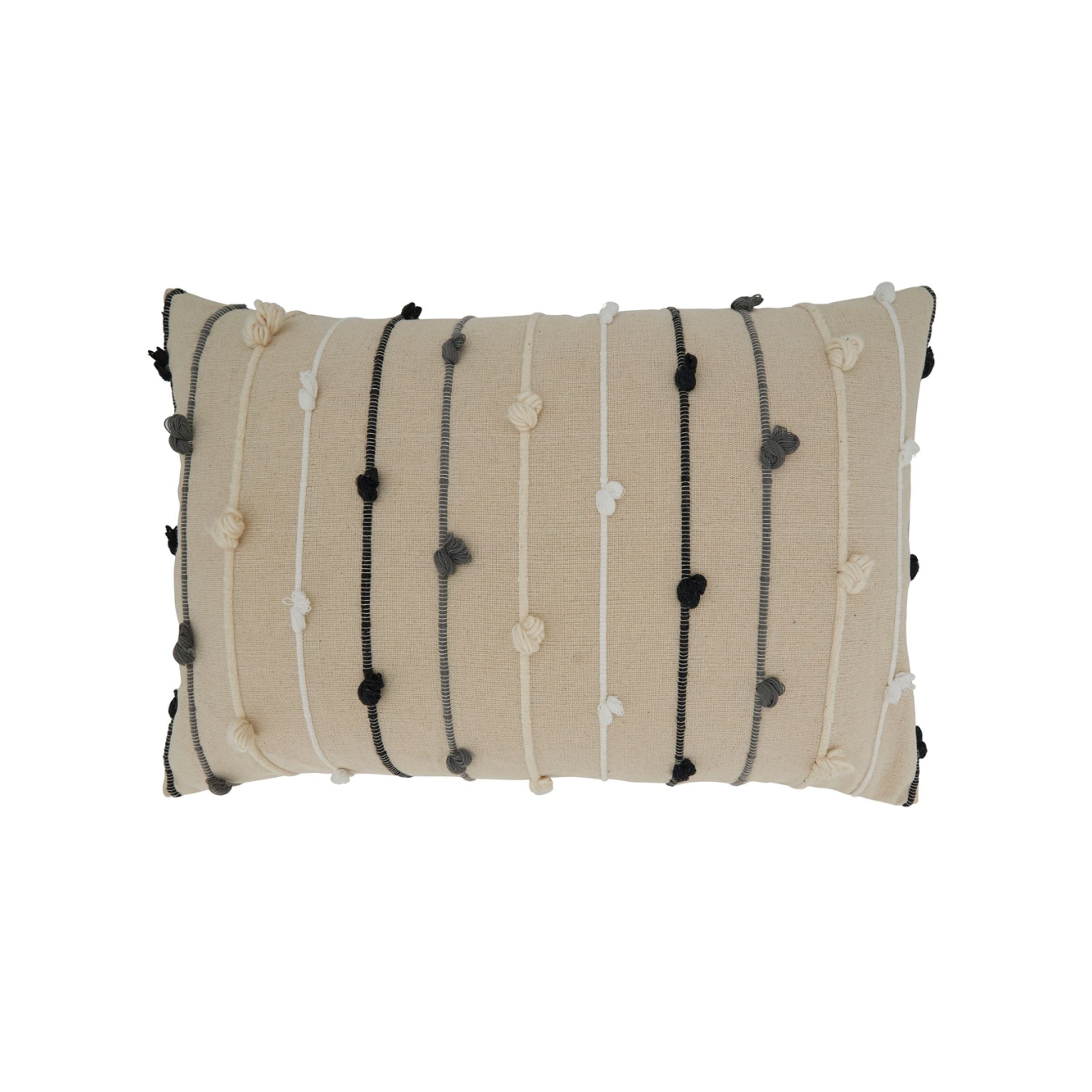 Beige rectangular pillow with black, white, and gray raised striped detailing.