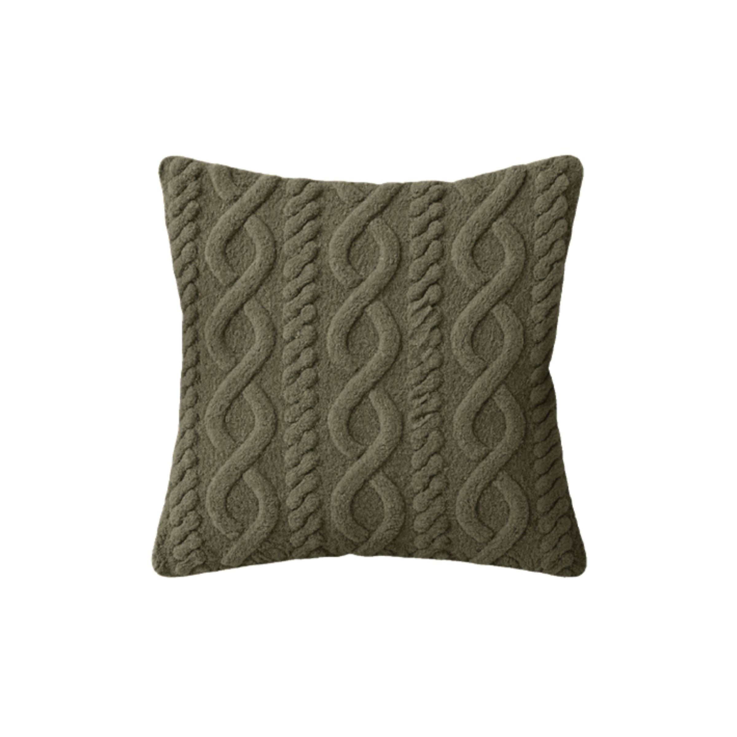 Square pillow with an olive green cable knit pattern.
