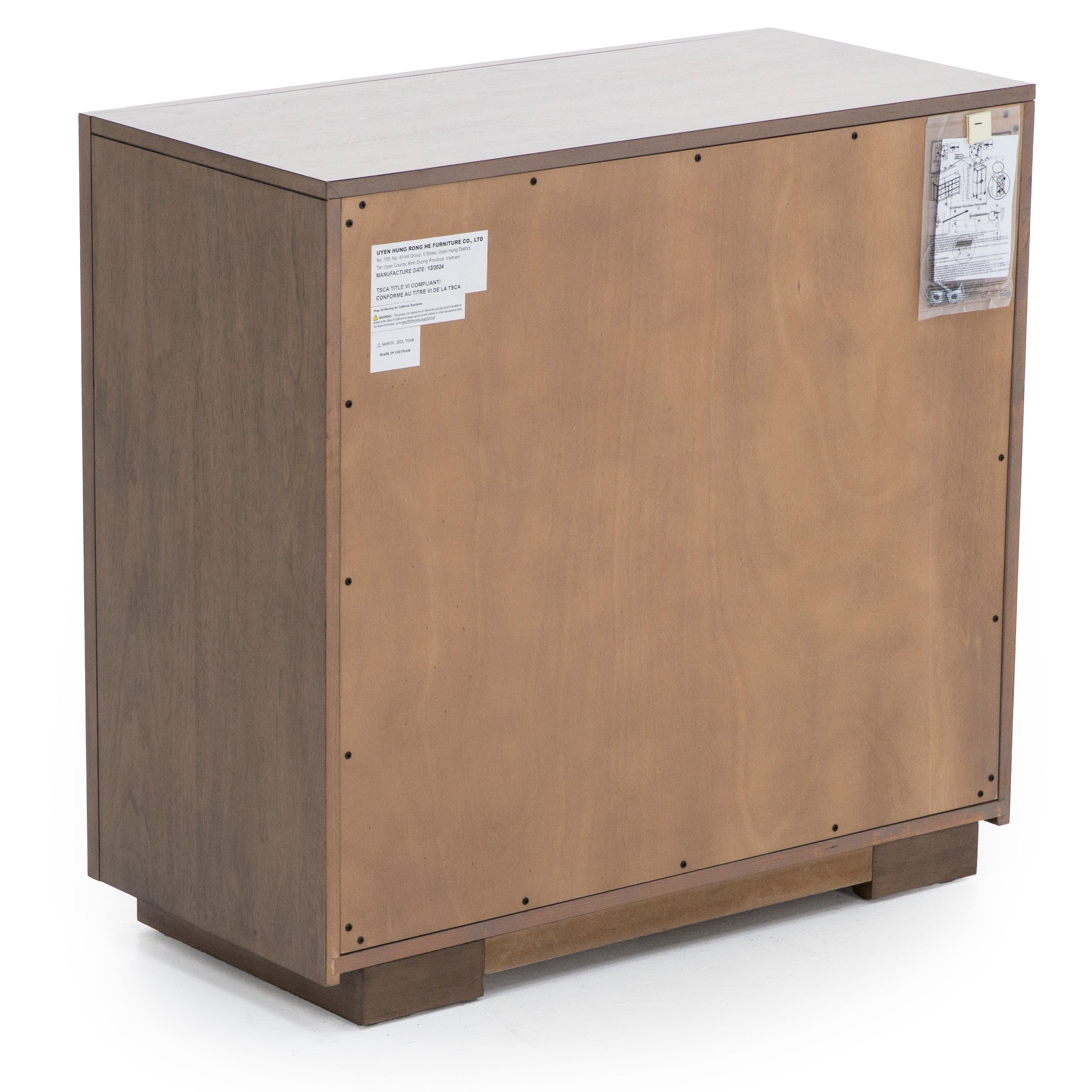 Back view of a wood cabinet with visible labels and assembly instructions.