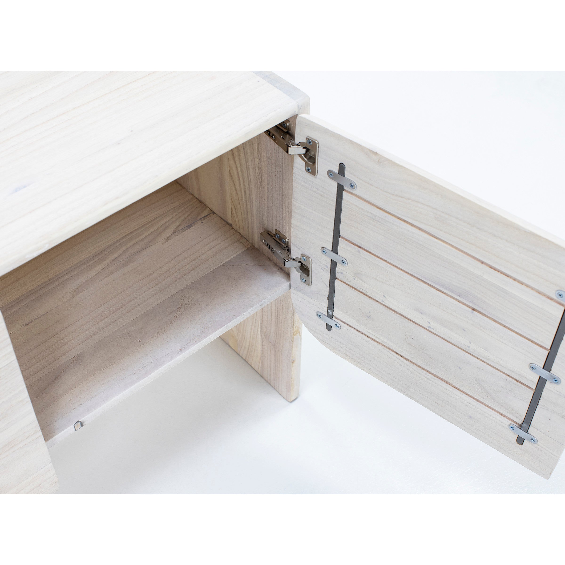 Open cabinet door showing light wood interior and metal hinges.