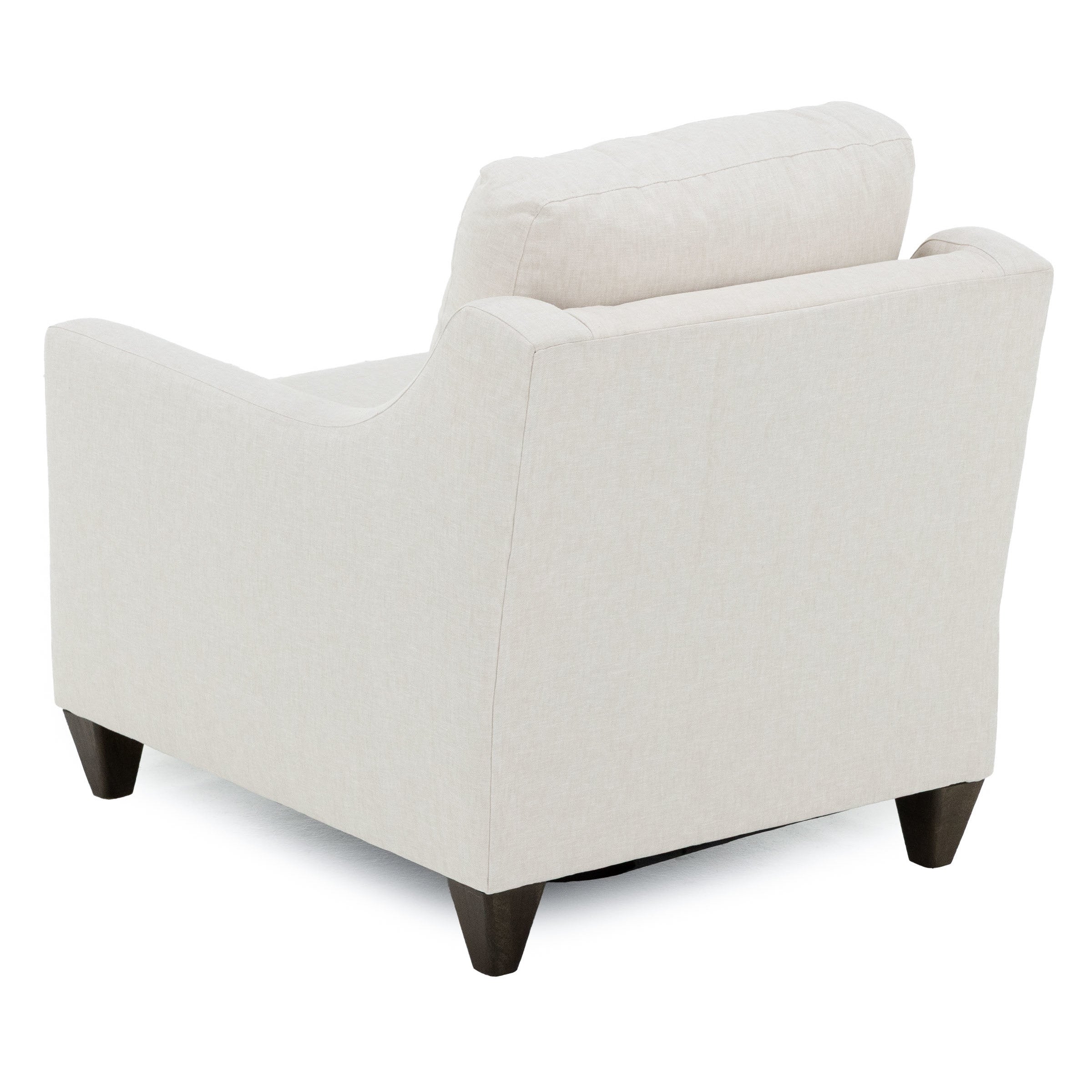 Back view of a modern light beige armchair with dark wood legs.