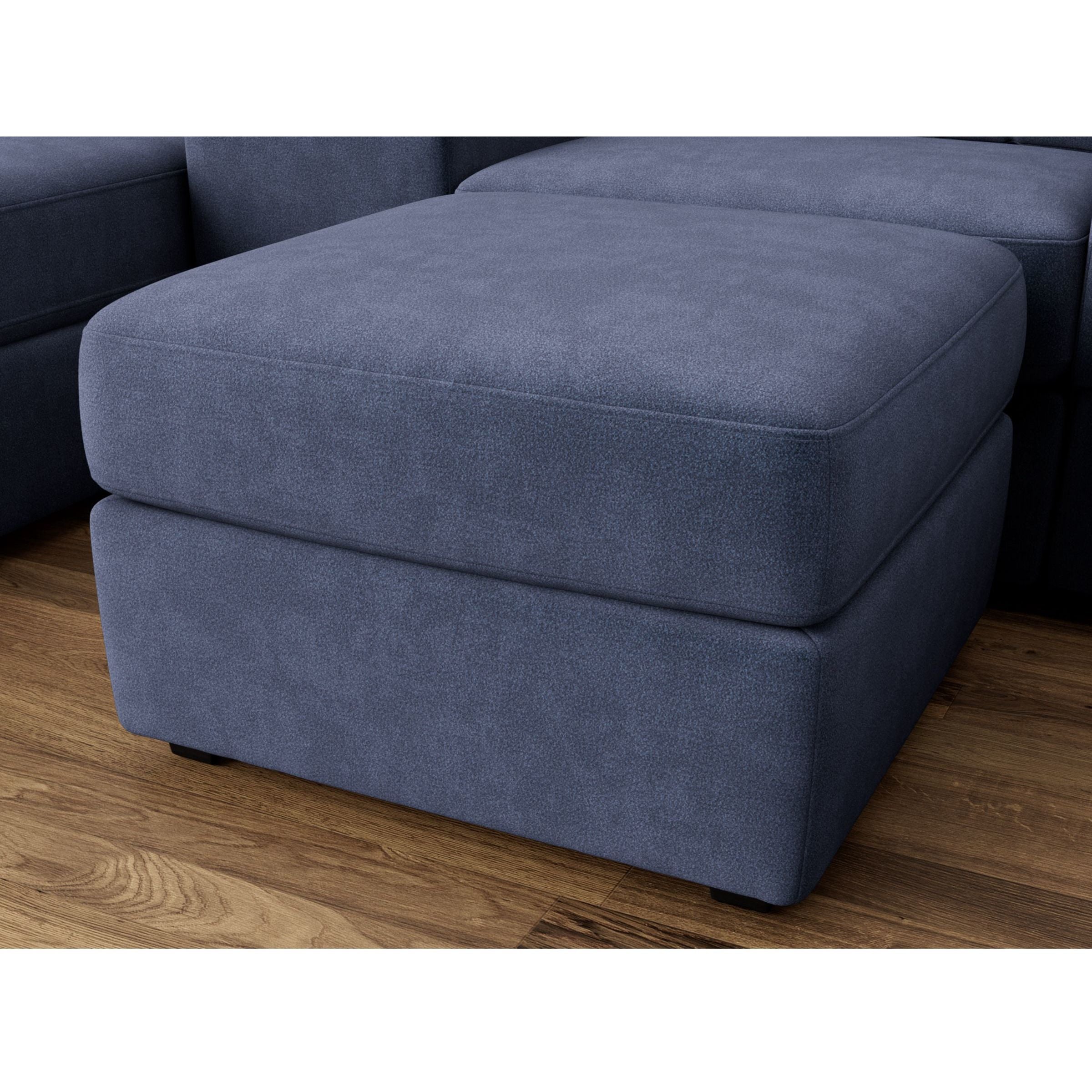 Blue upholstered ottoman on hardwood floor