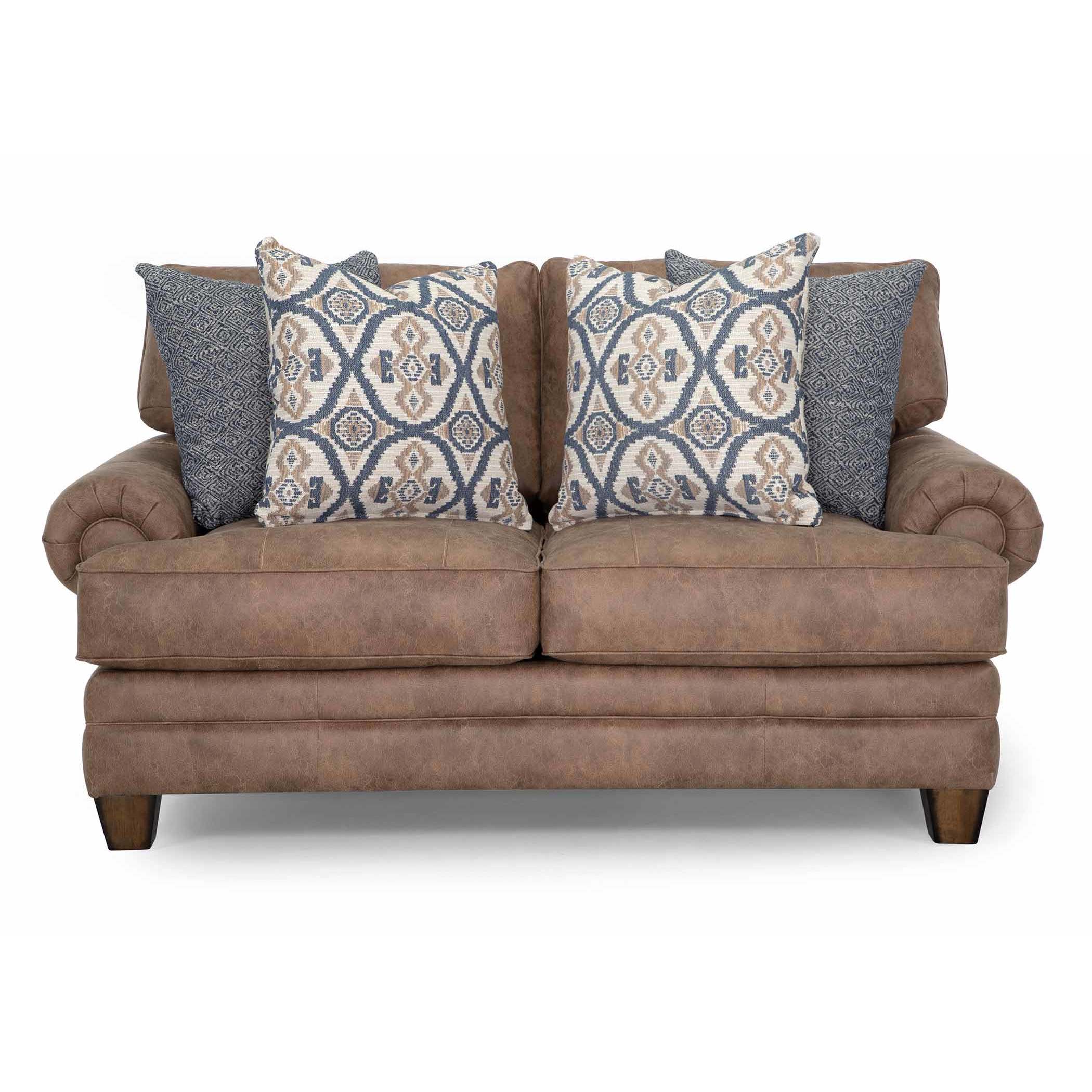 Brown loveseat with rolled arms and four patterned throw pillows