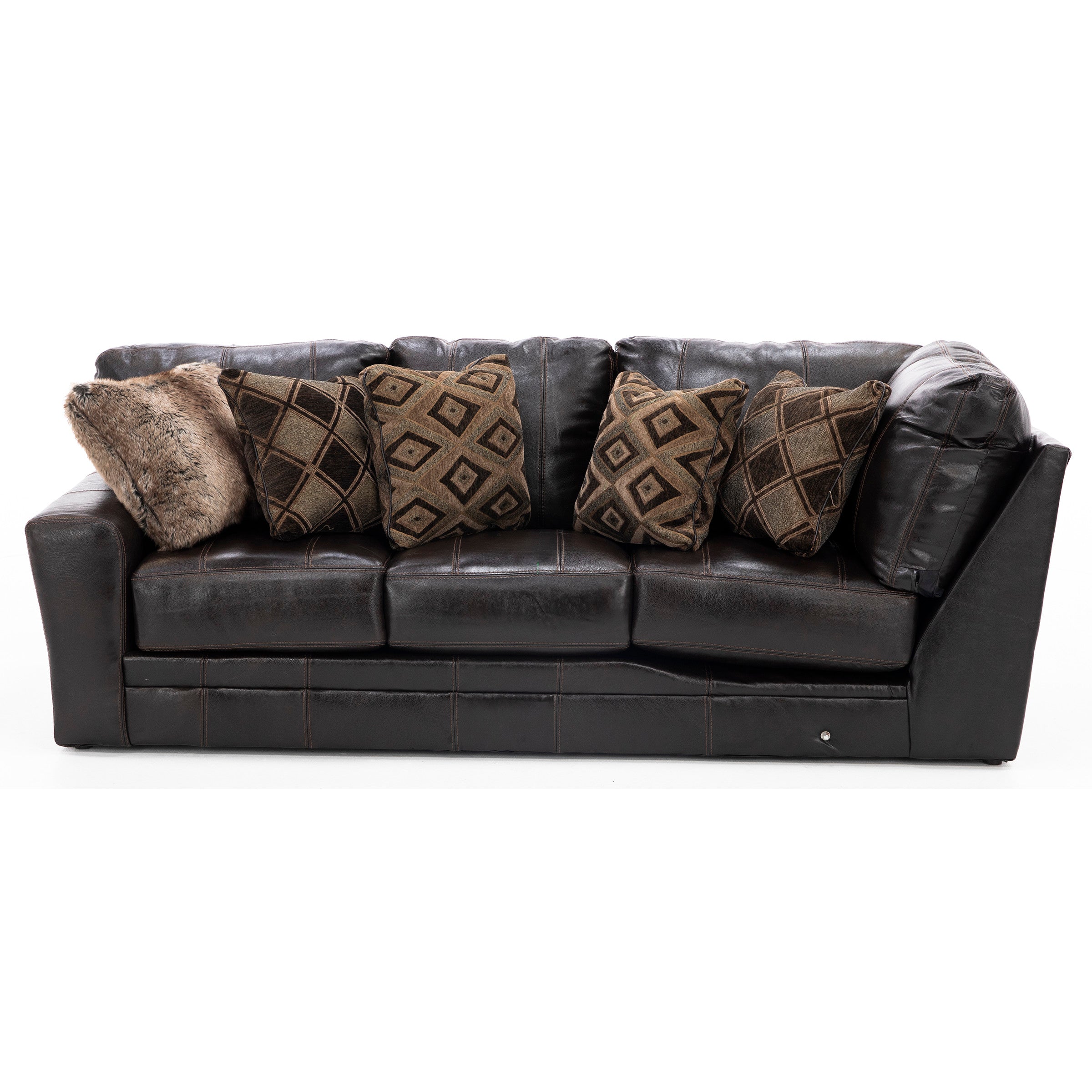 Dark brown leather sofa with five patterned and fur accent pillows.