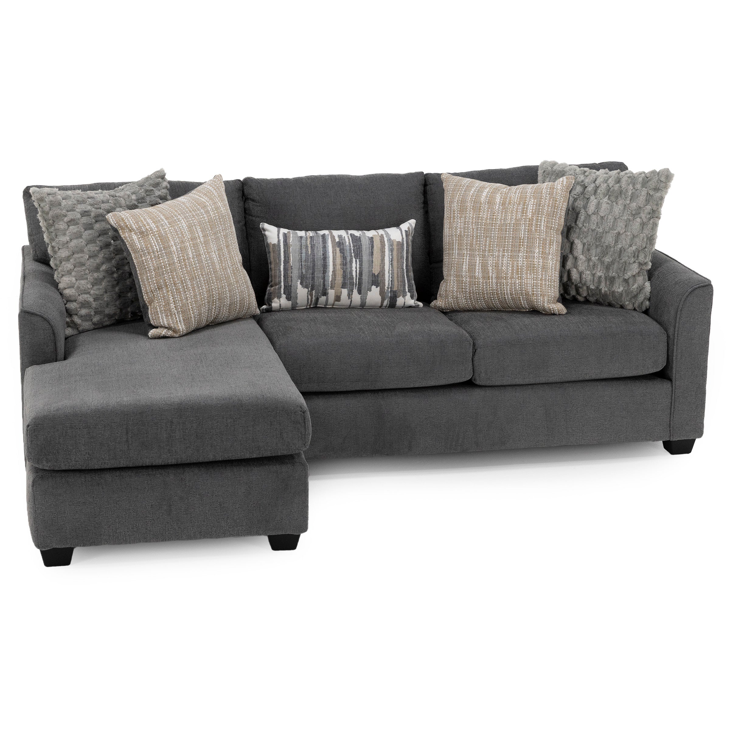 Modern dark gray sectional sofa with assorted neutral throw pillows.