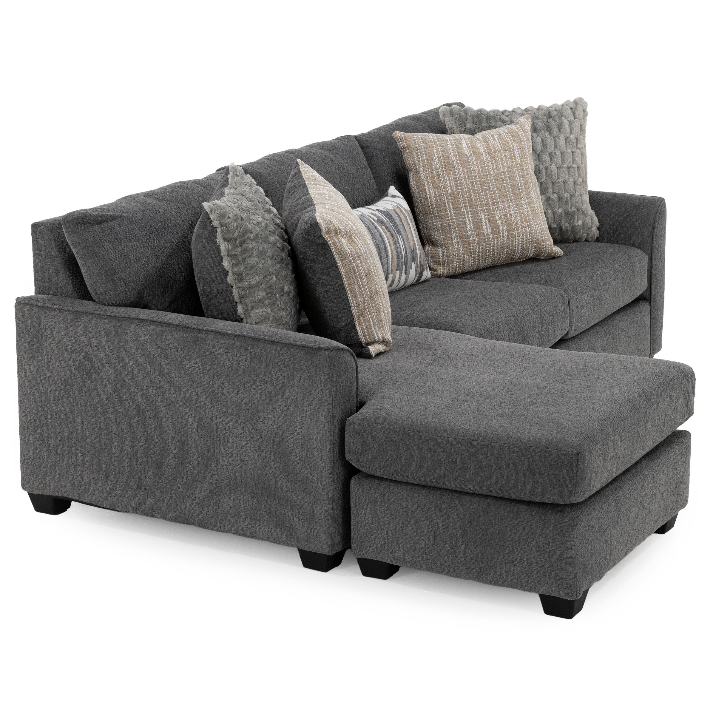 Dark gray sectional sofa with chaise lounge, featuring assorted decorative pillows.