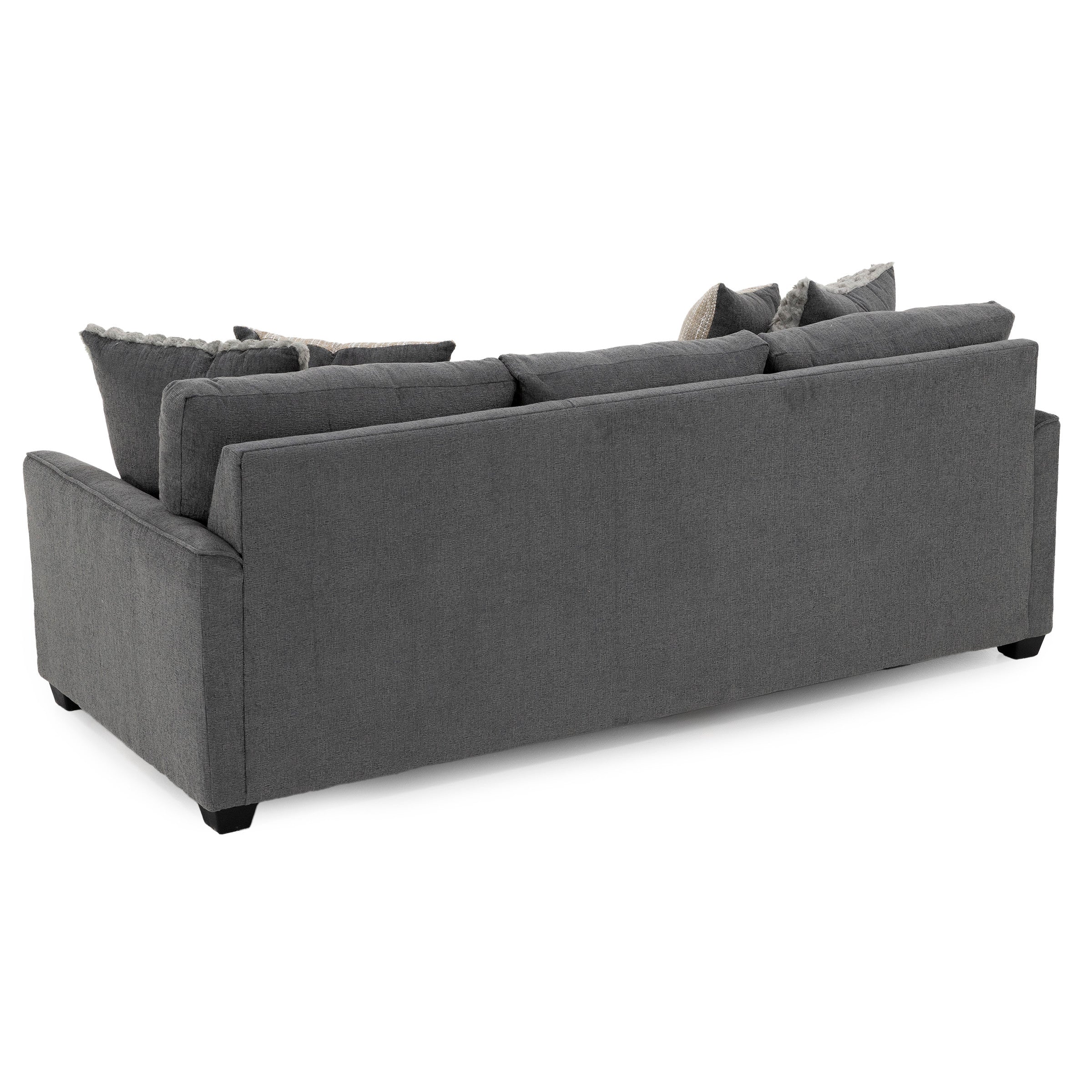 Back view of a modern gray sofa with multiple cushions.