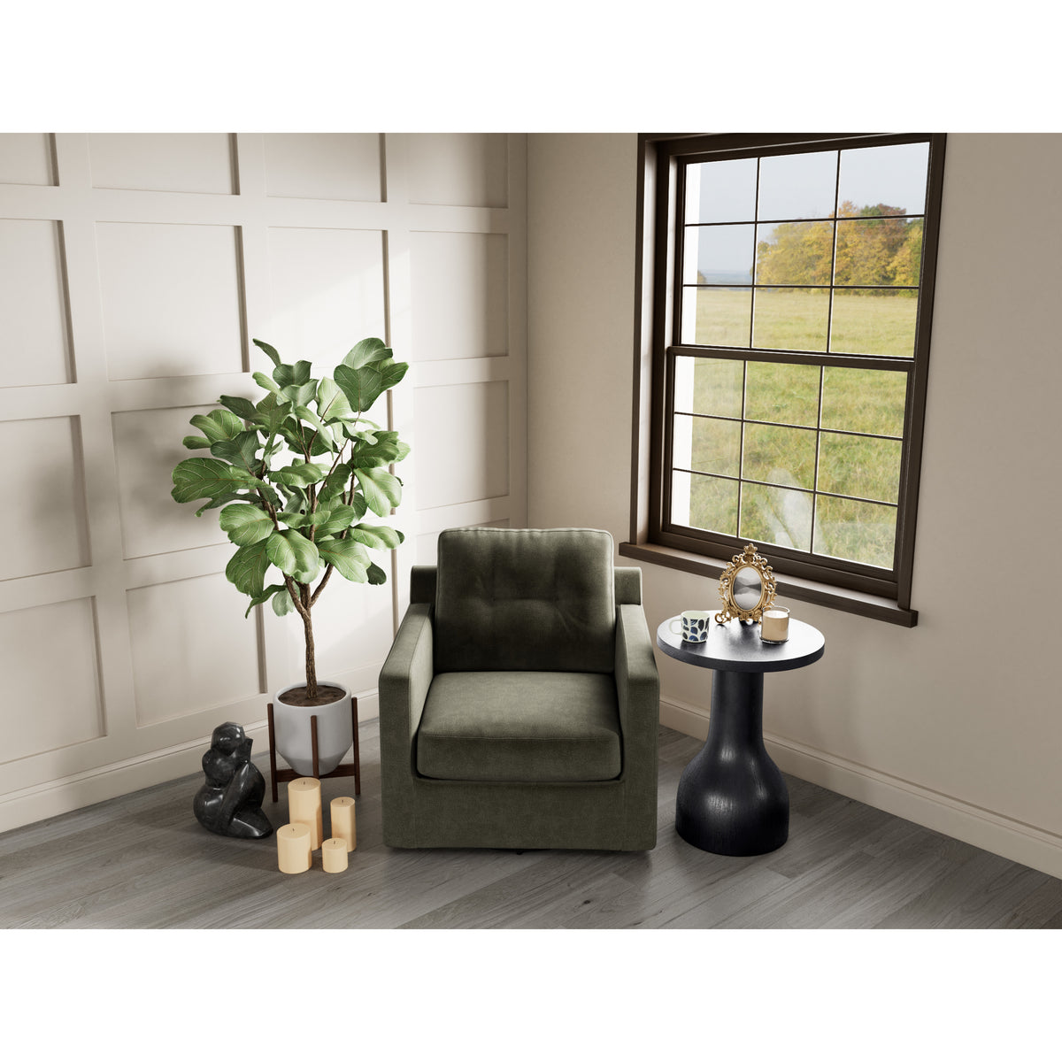 Green armchair with side table, indoor plant, and window overlooking a grassy field.