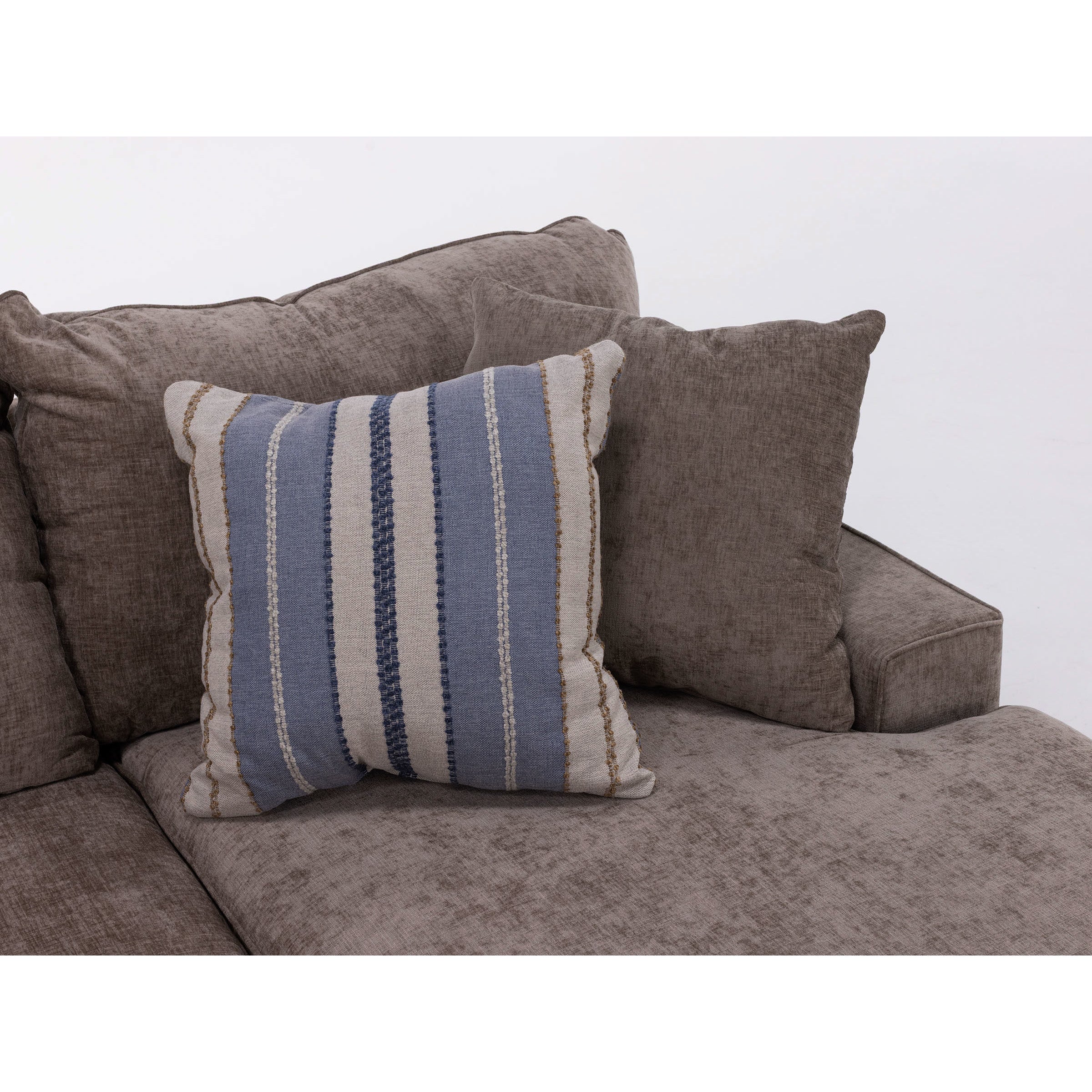 Gray sofa with a blue and beige striped accent pillow.