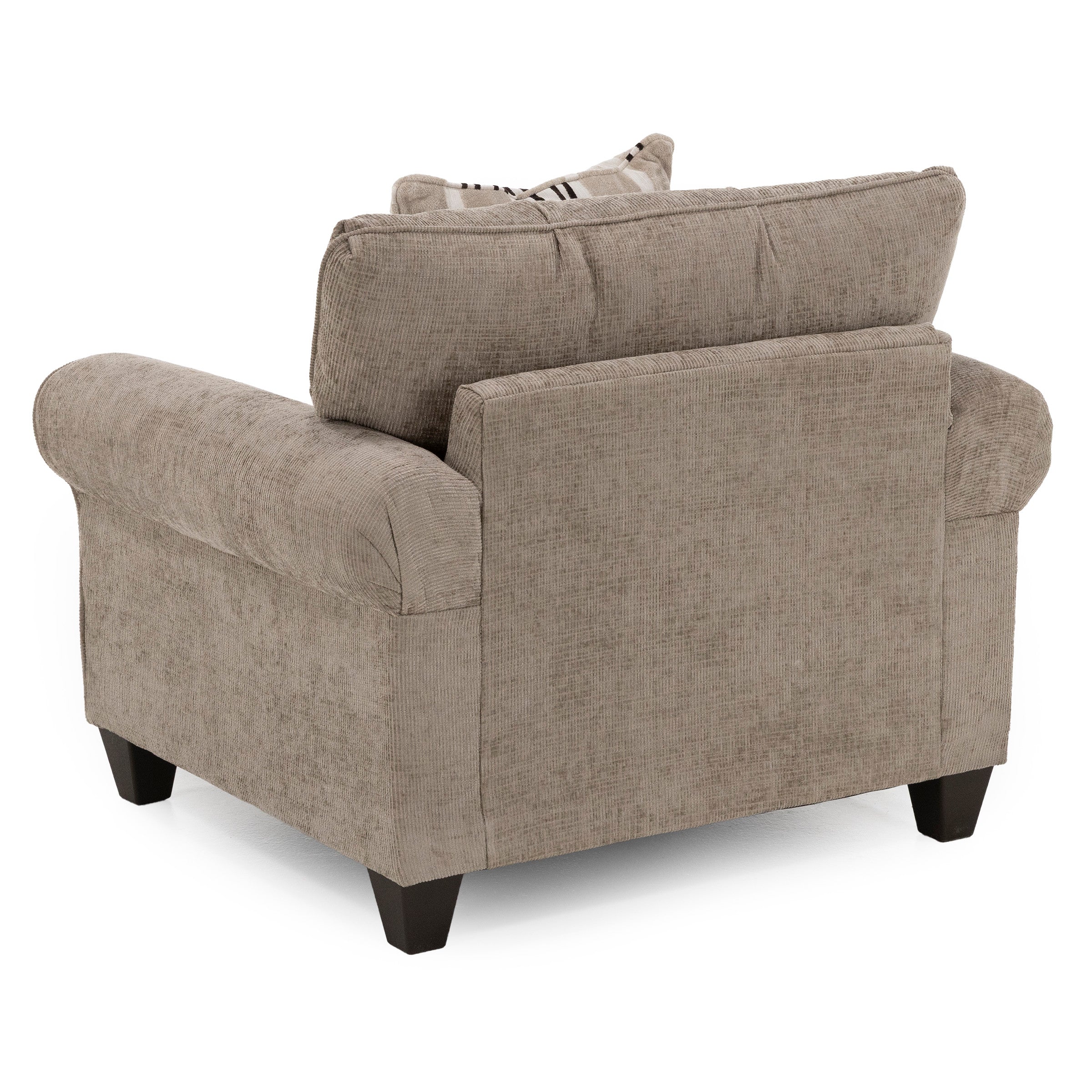 Back view of a taupe upholstered armchair with wide arms and dark wood legs.
