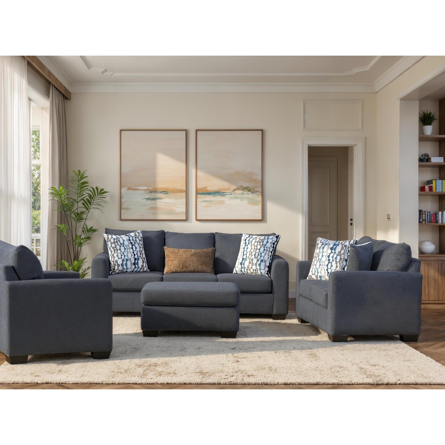 Modern living room with dark blue sofas, patterned pillows, and two abstract paintings on the wall.