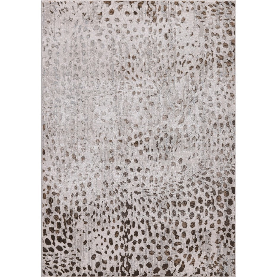 Neutral area rug with abstract animal print pattern.