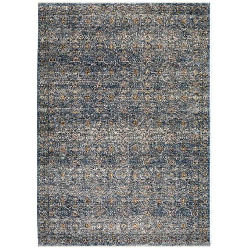 Blue and brown distressed area rug with intricate geometric pattern.