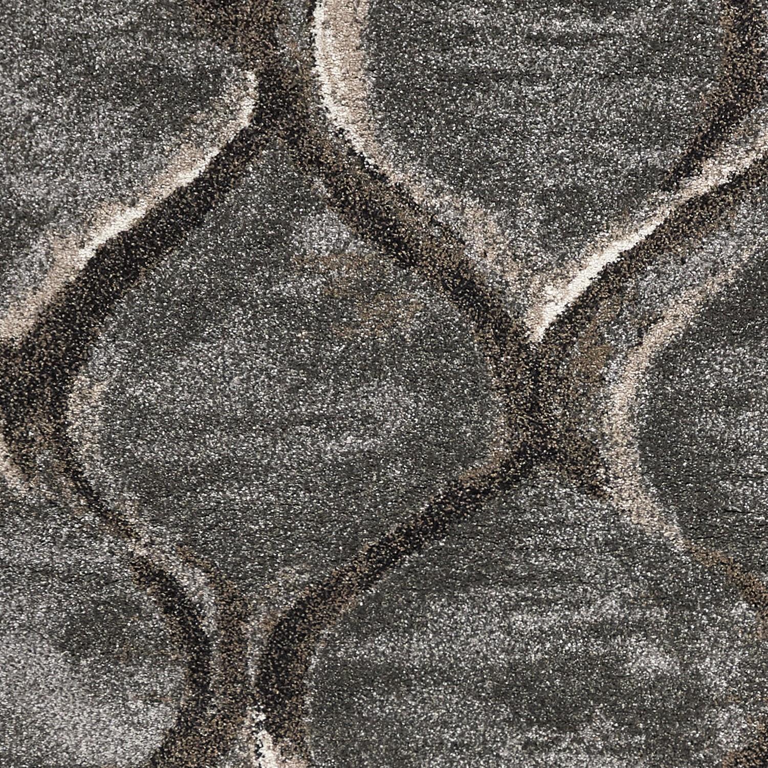 Gray and brown rug with abstract wave pattern.