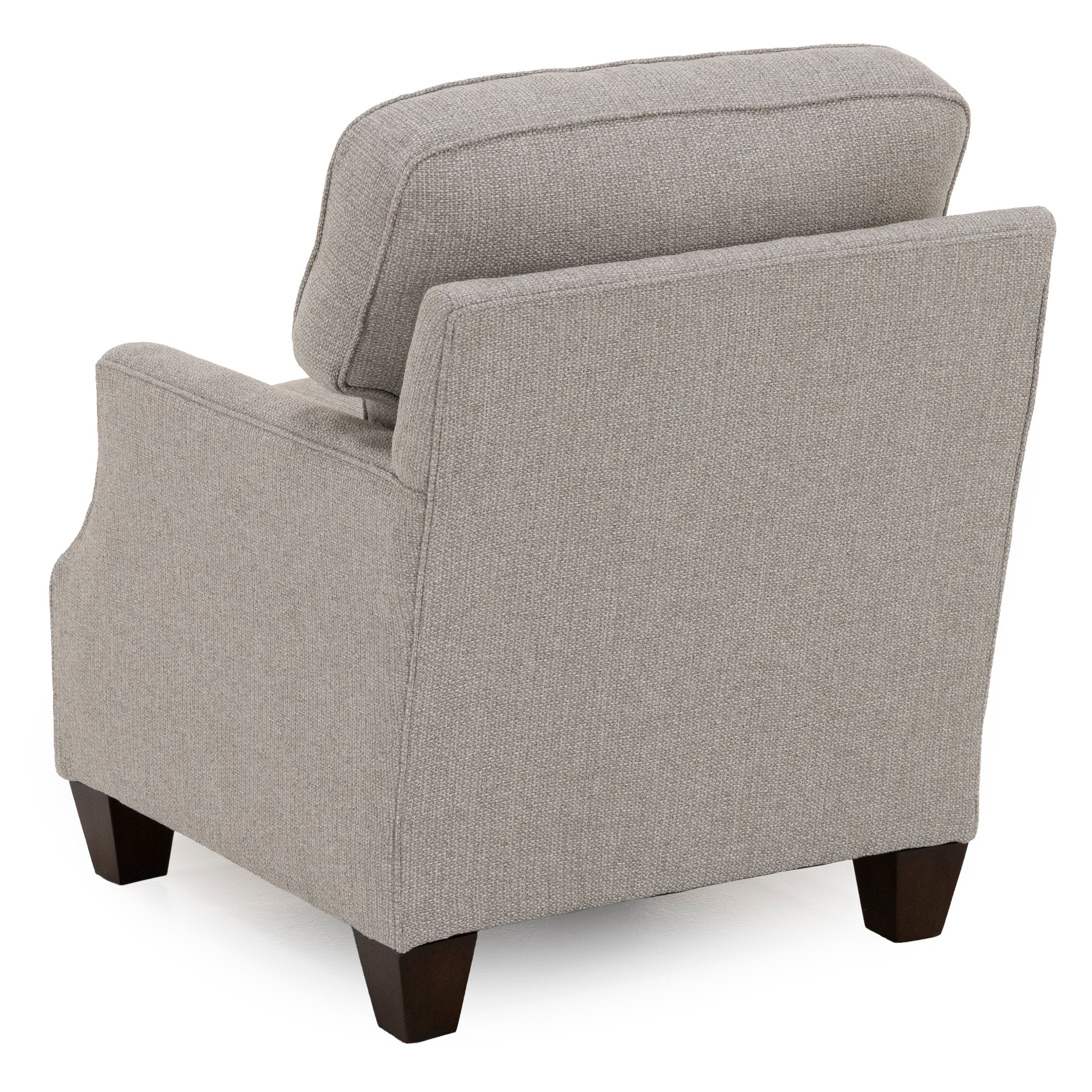Back view of a modern light gray upholstered armchair with dark wooden legs.