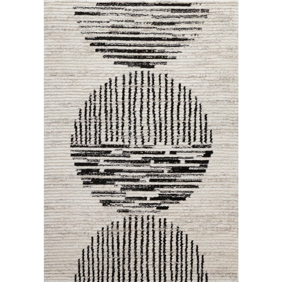 Beige rug with black geometric circles and lines pattern.