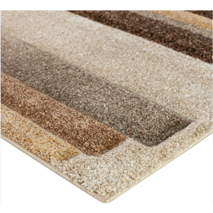 Close-up of a plush area rug with alternating beige and brown stripes.