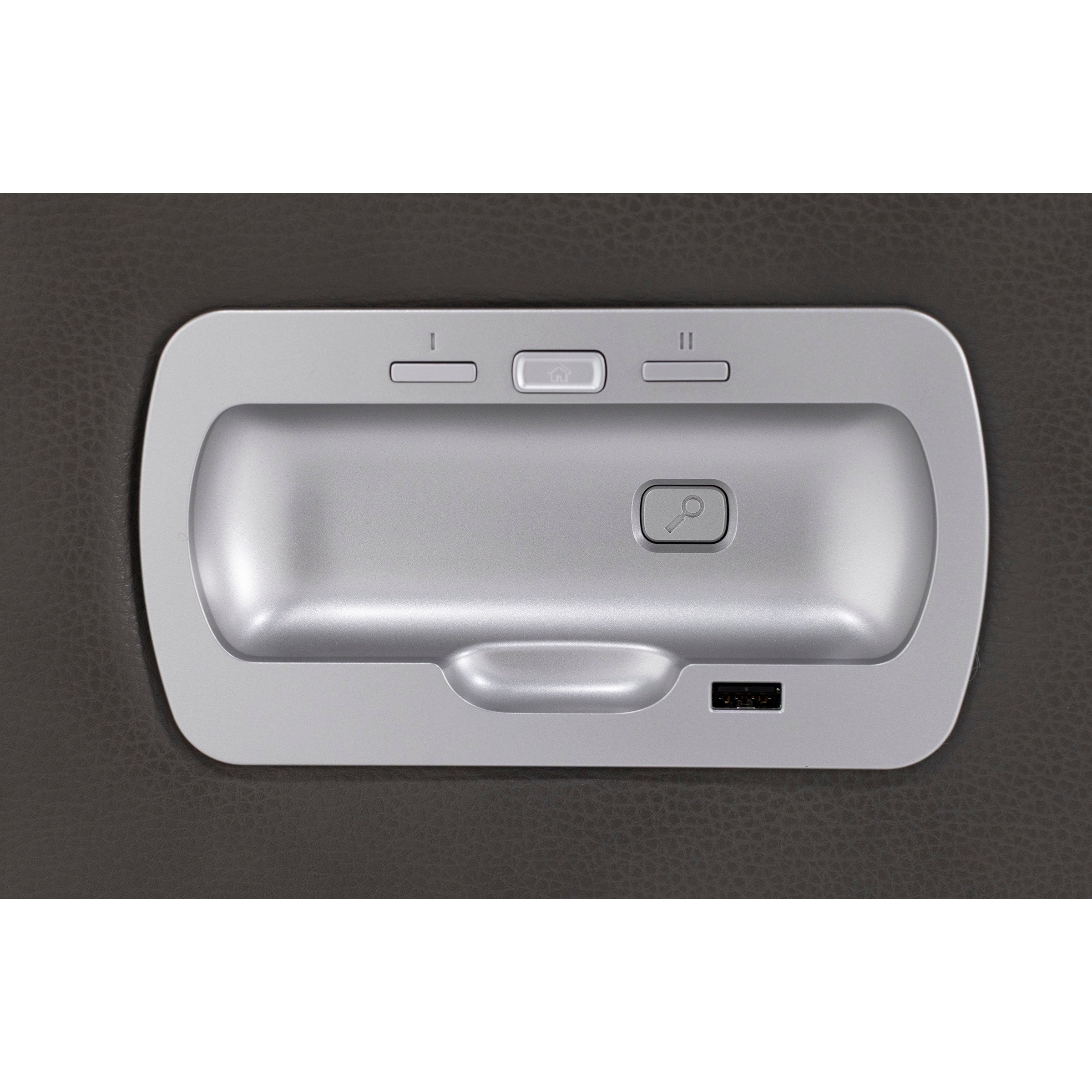 Close-up of a control panel with buttons and a USB port on a gray surface.