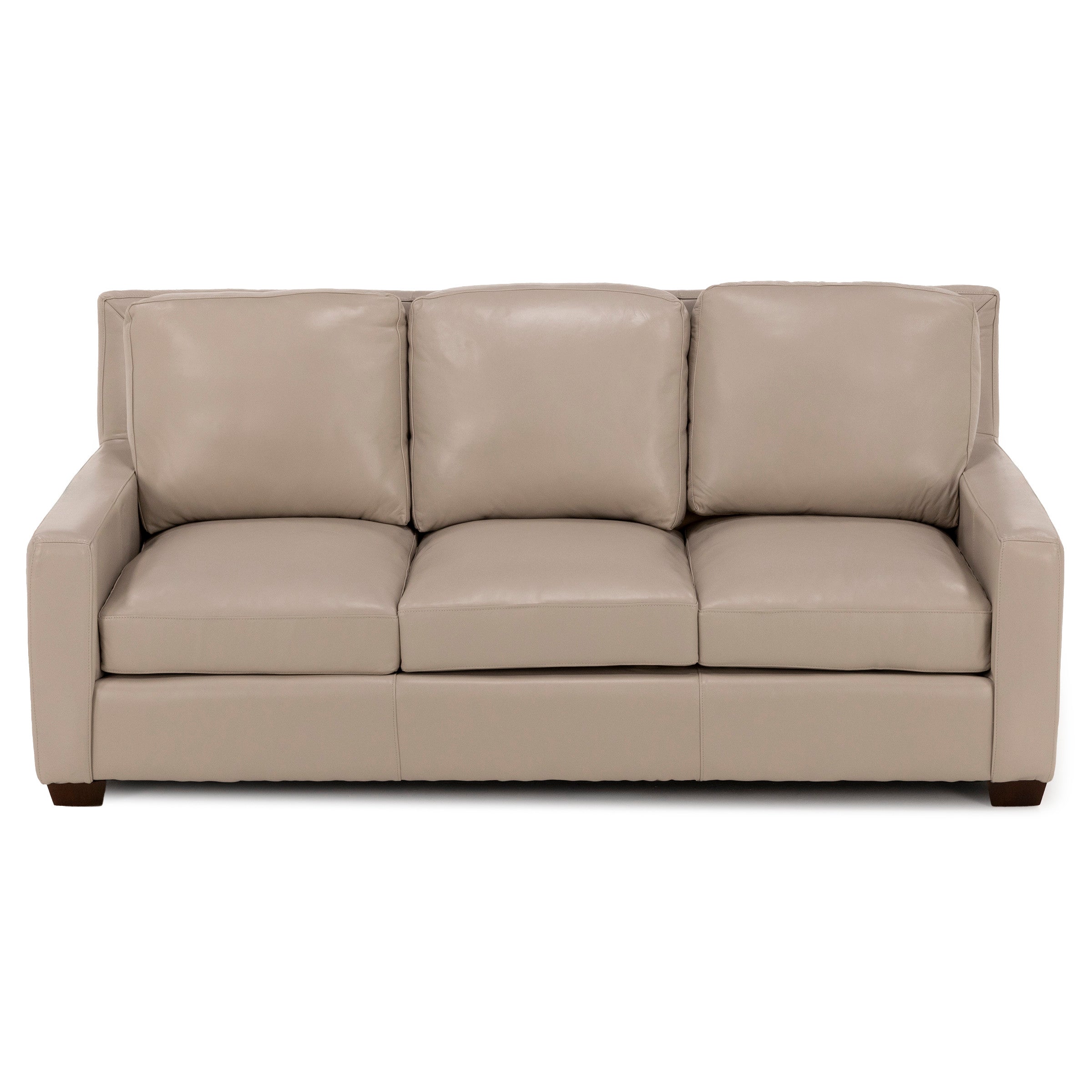 Beige leather three-seat sofa with boxy arms and plush cushions.