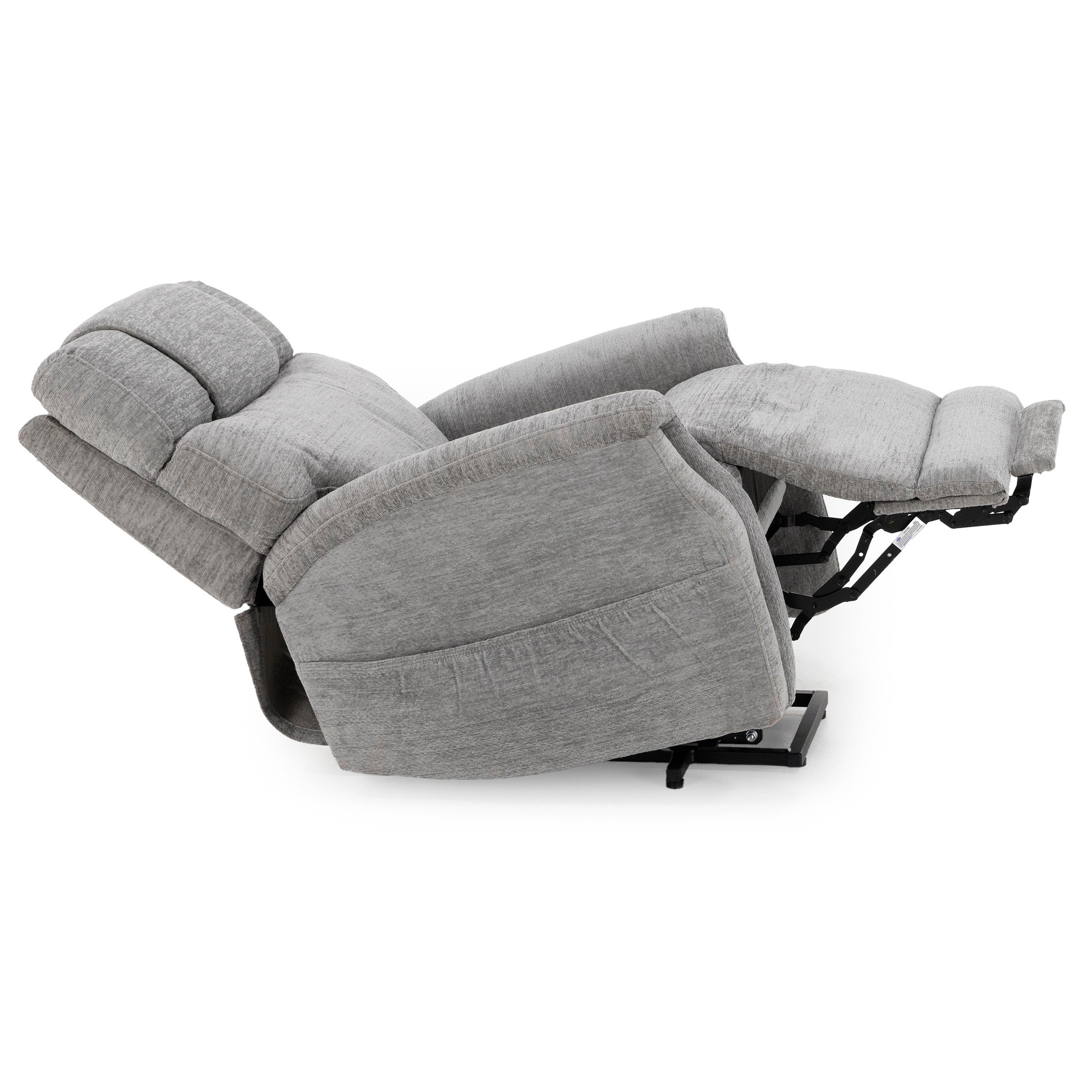 Side view of a gray recliner chair fully extended with raised footrest.