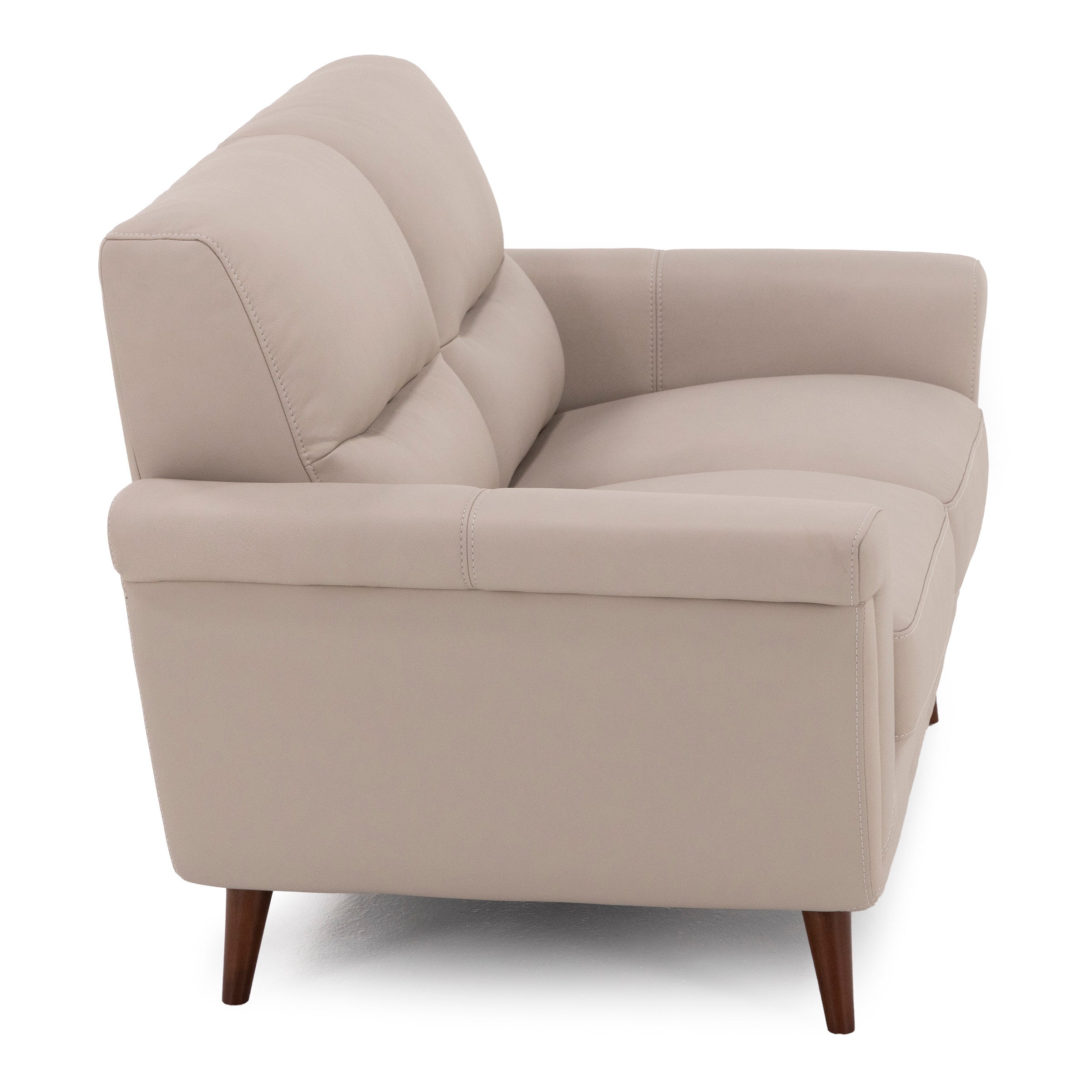 Beige upholstered loveseat with wooden legs, shown from a side angle.