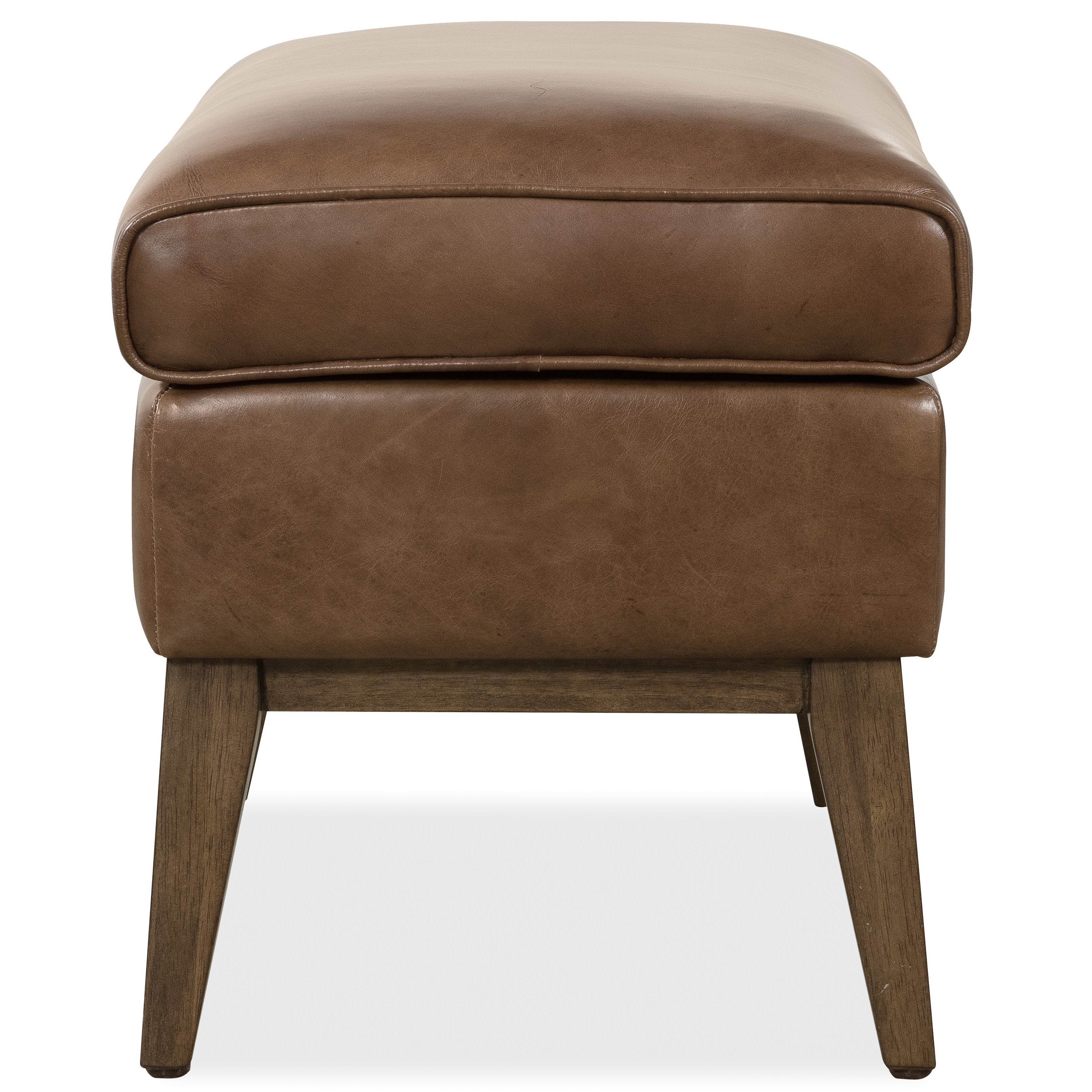 Brown leather ottoman with wooden legs, front view.