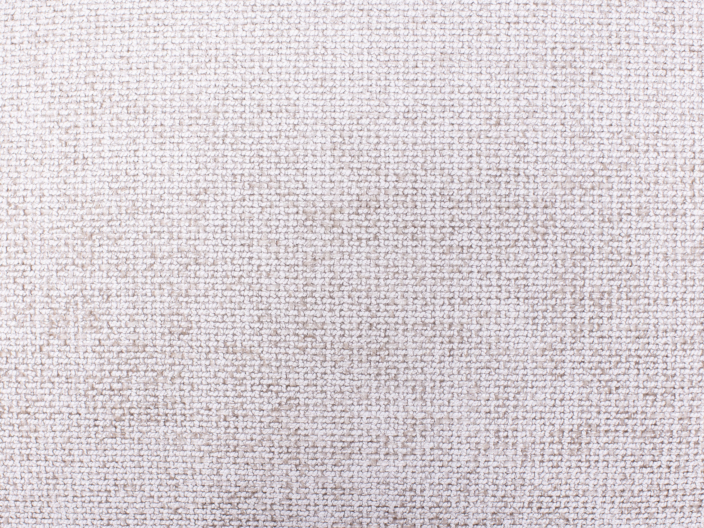 Close-up of light beige woven fabric texture.