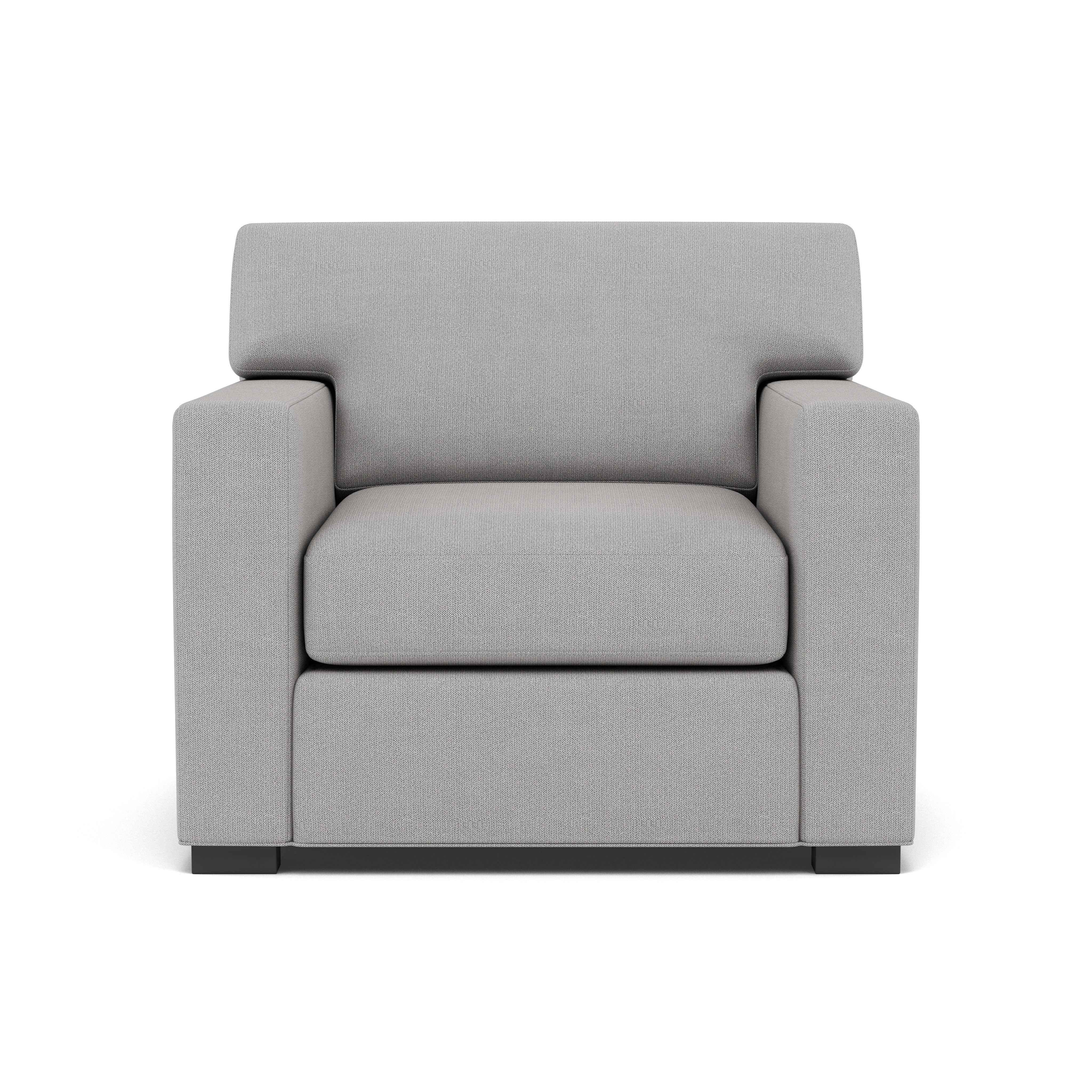 Front view of a modern gray armchair with square arms and clean lines.