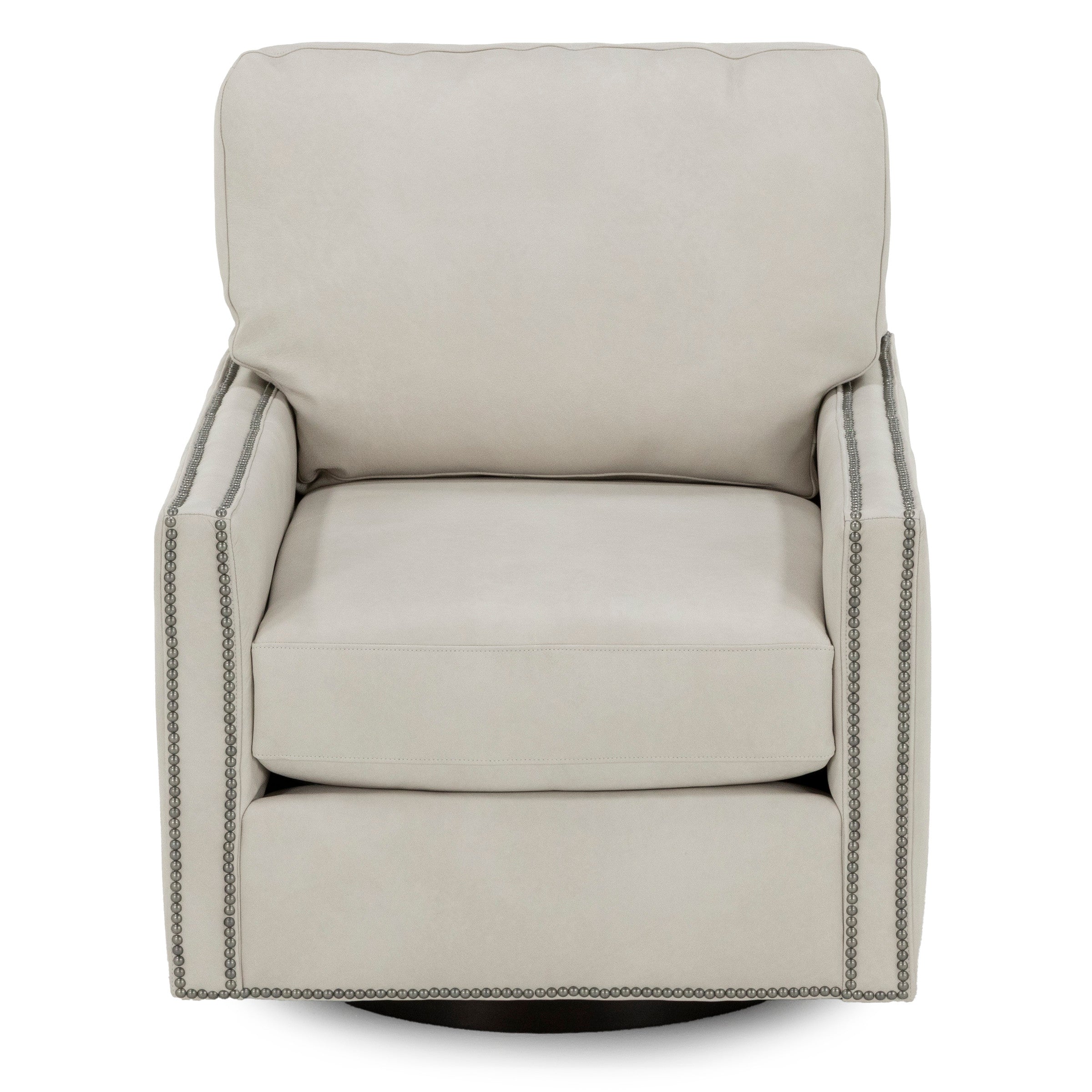 Light gray swivel armchair with piped edges and nailhead trim.