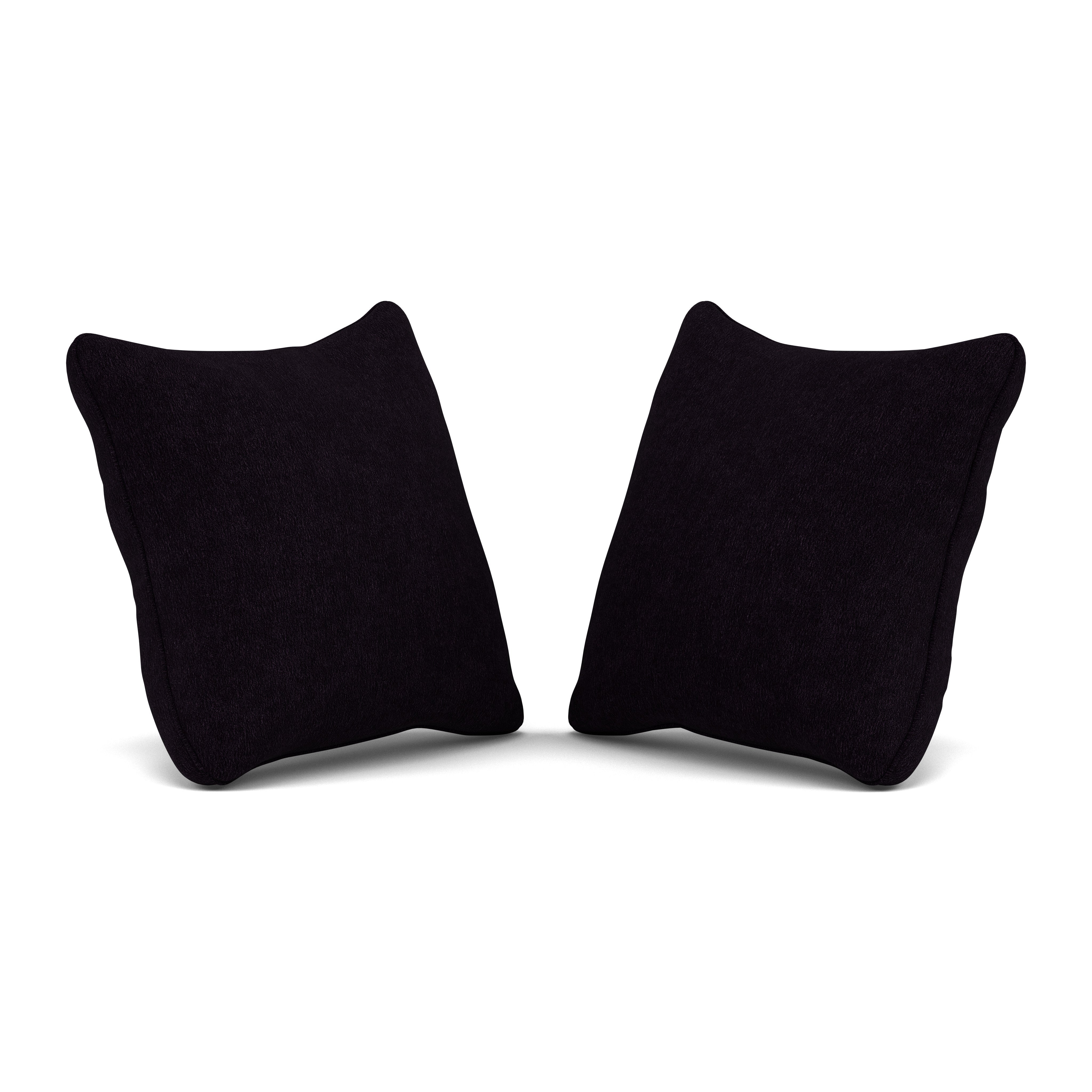 Two black square accent pillows on a white background.