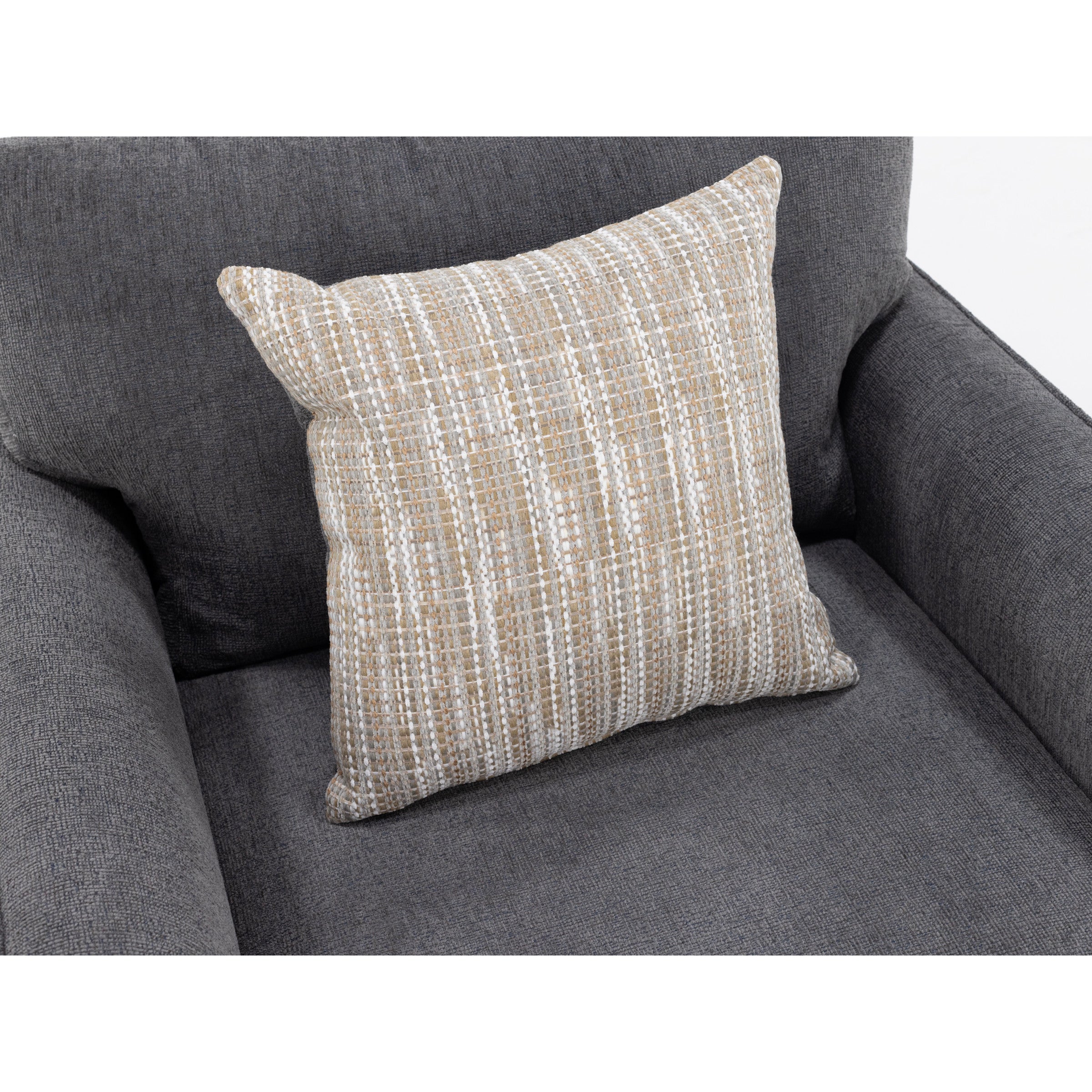 Beige and white woven pillow on a gray upholstered armchair.
