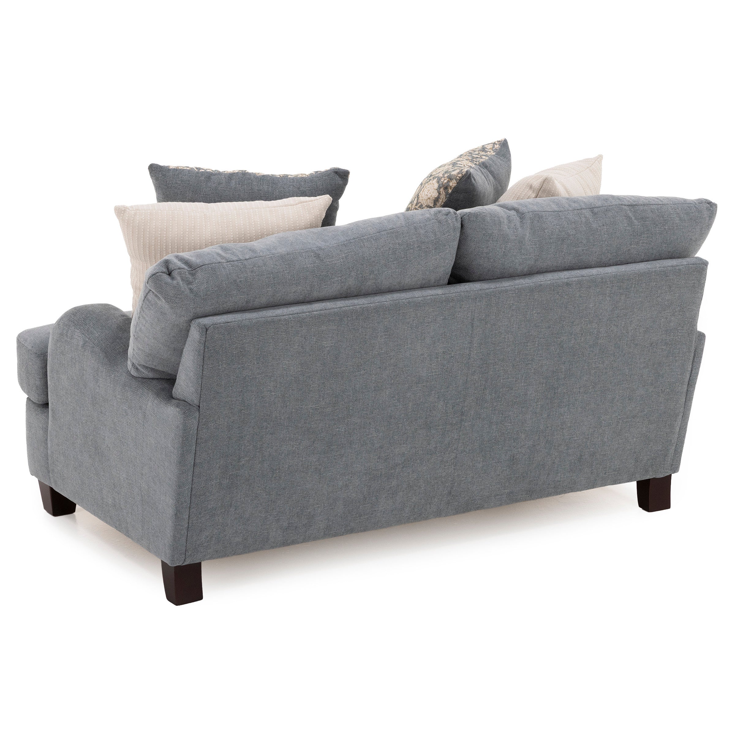 Back view of a gray upholstered sofa with multiple accent pillows.
