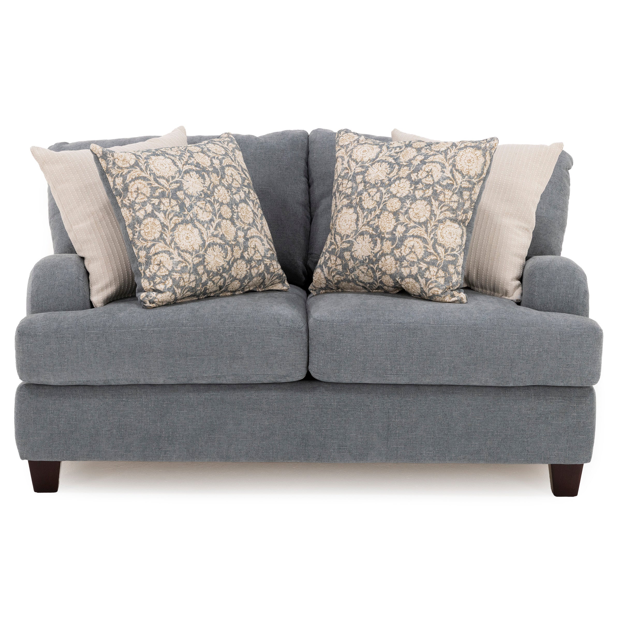 Gray loveseat with floral and beige pillows, front view.
