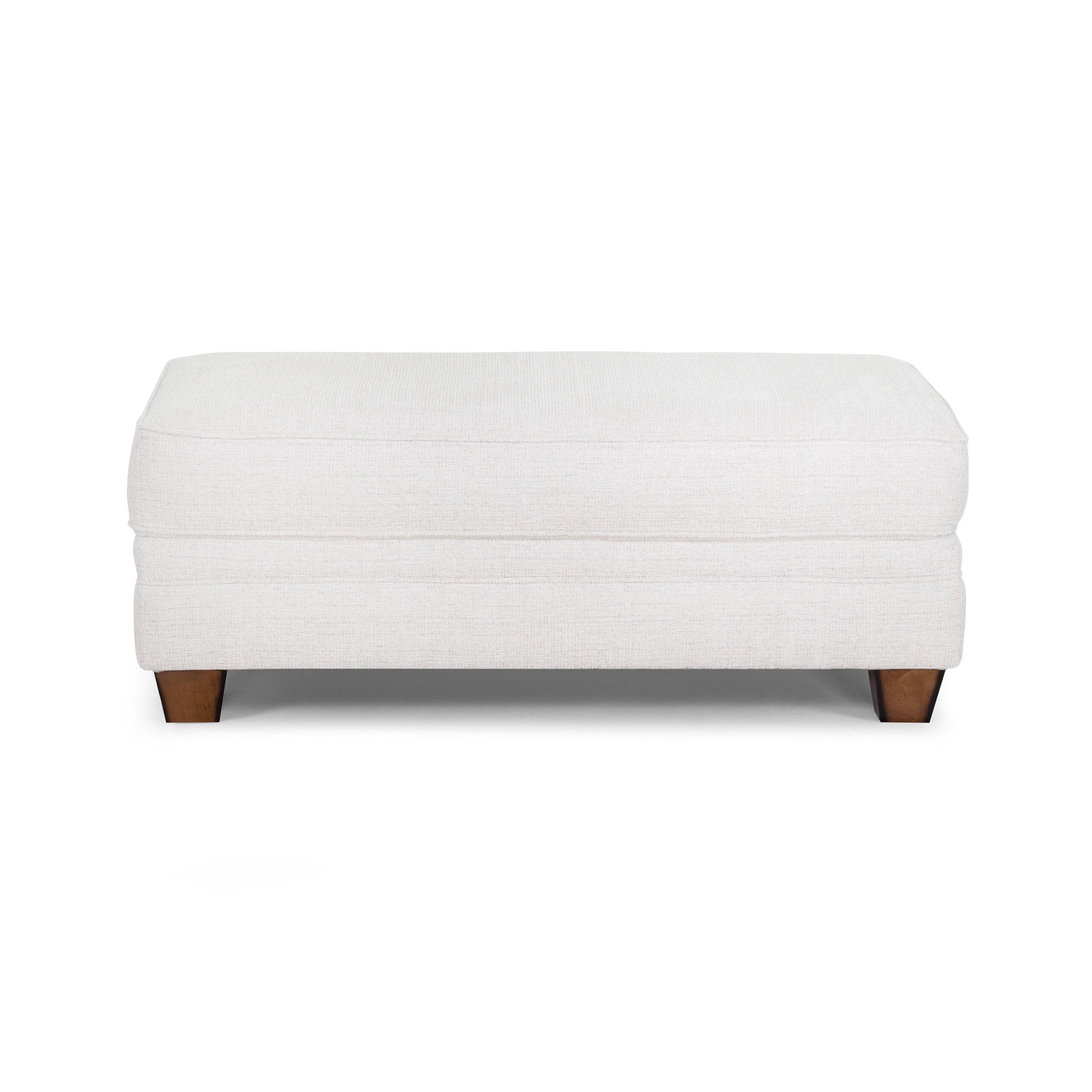 Rectangular white upholstered ottoman with short wooden legs.