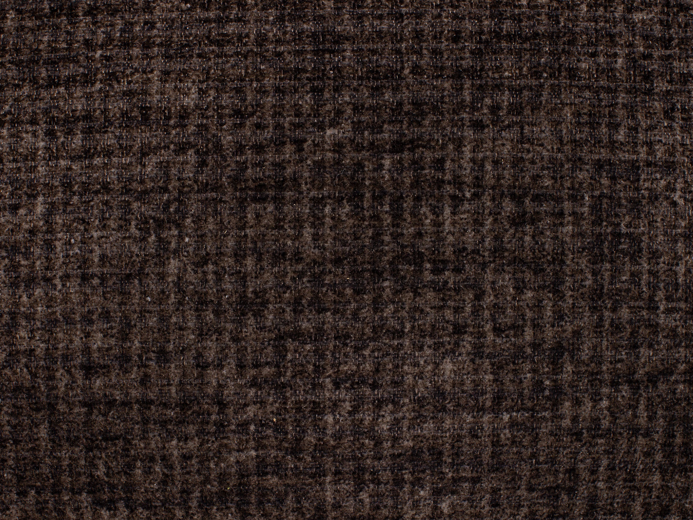 Dark brown textured fabric swatch.