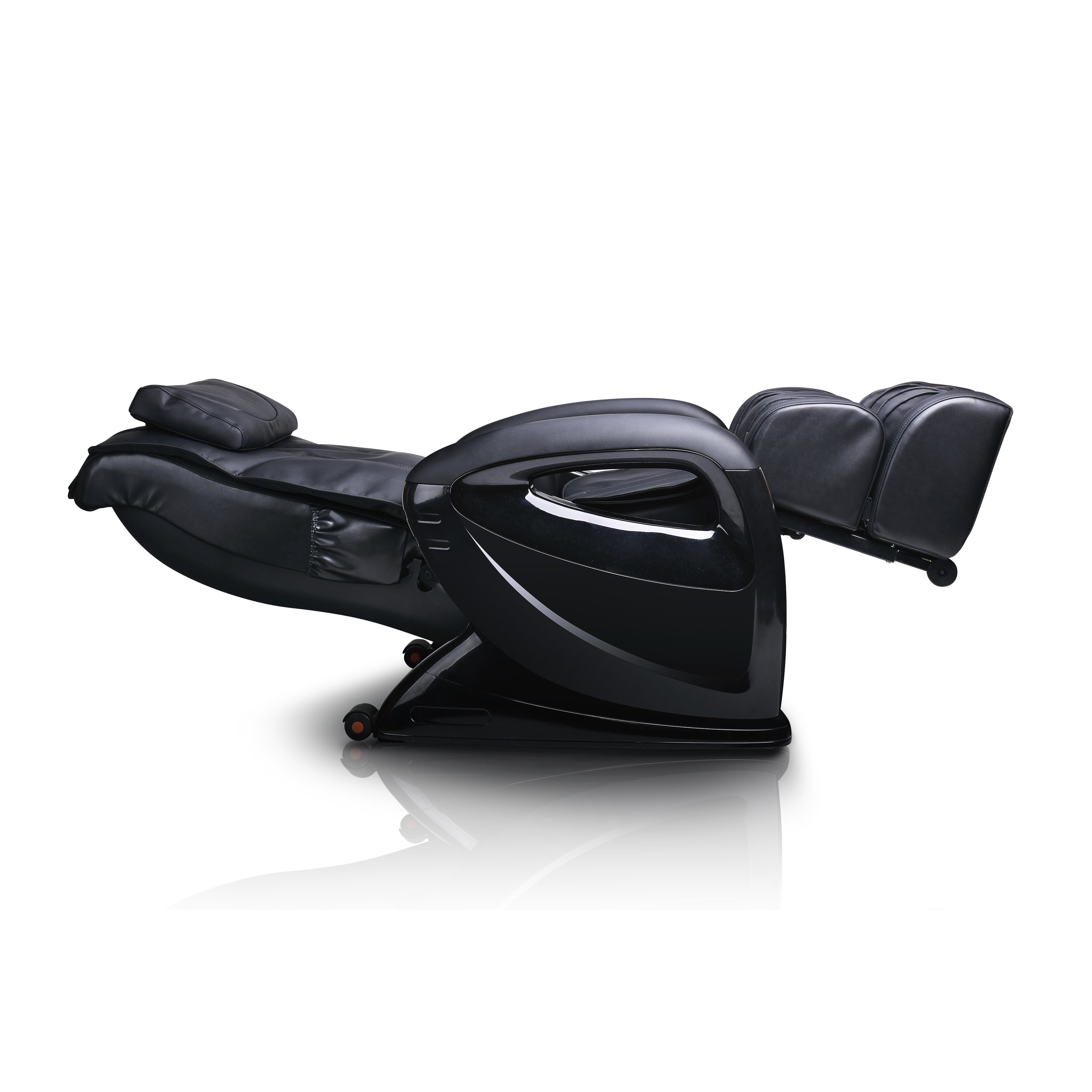 Black massage chair in reclined position on white background