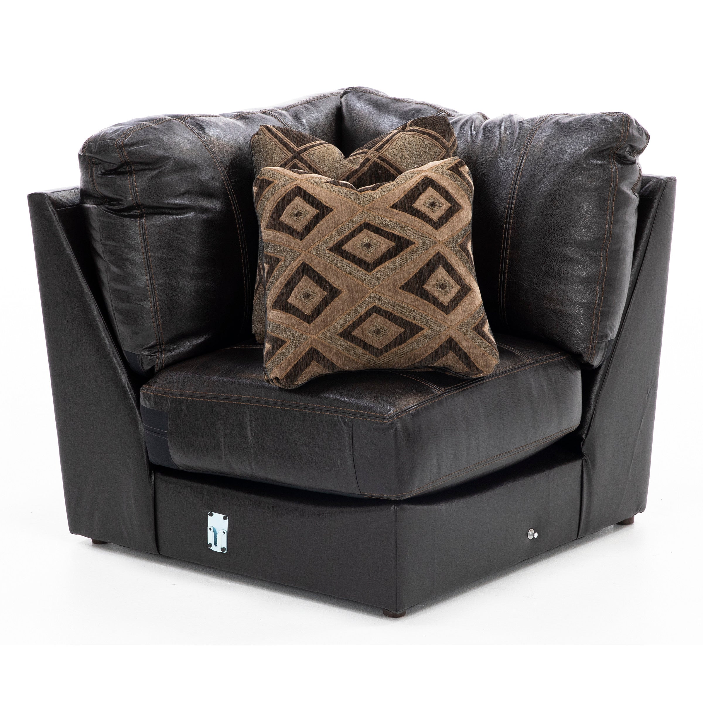 Black leather corner chair with two brown patterned accent pillows.