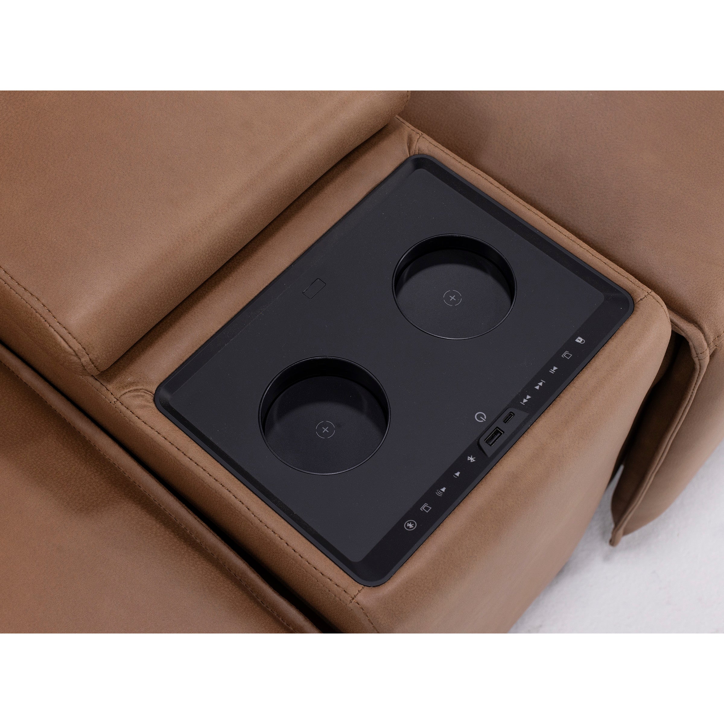 Leather recliner armrest with built-in cup holders, USB port, and control panel.