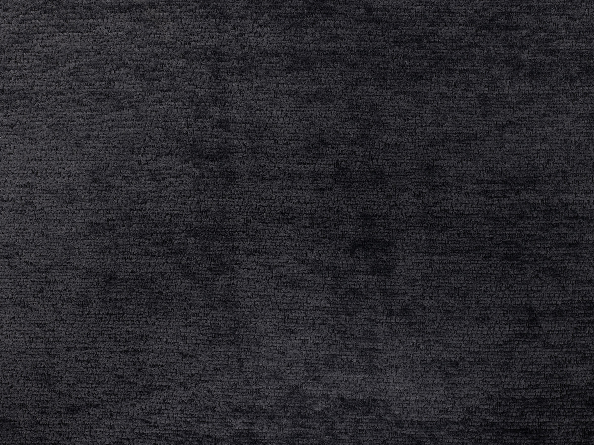 Dark grey textured fabric swatch.