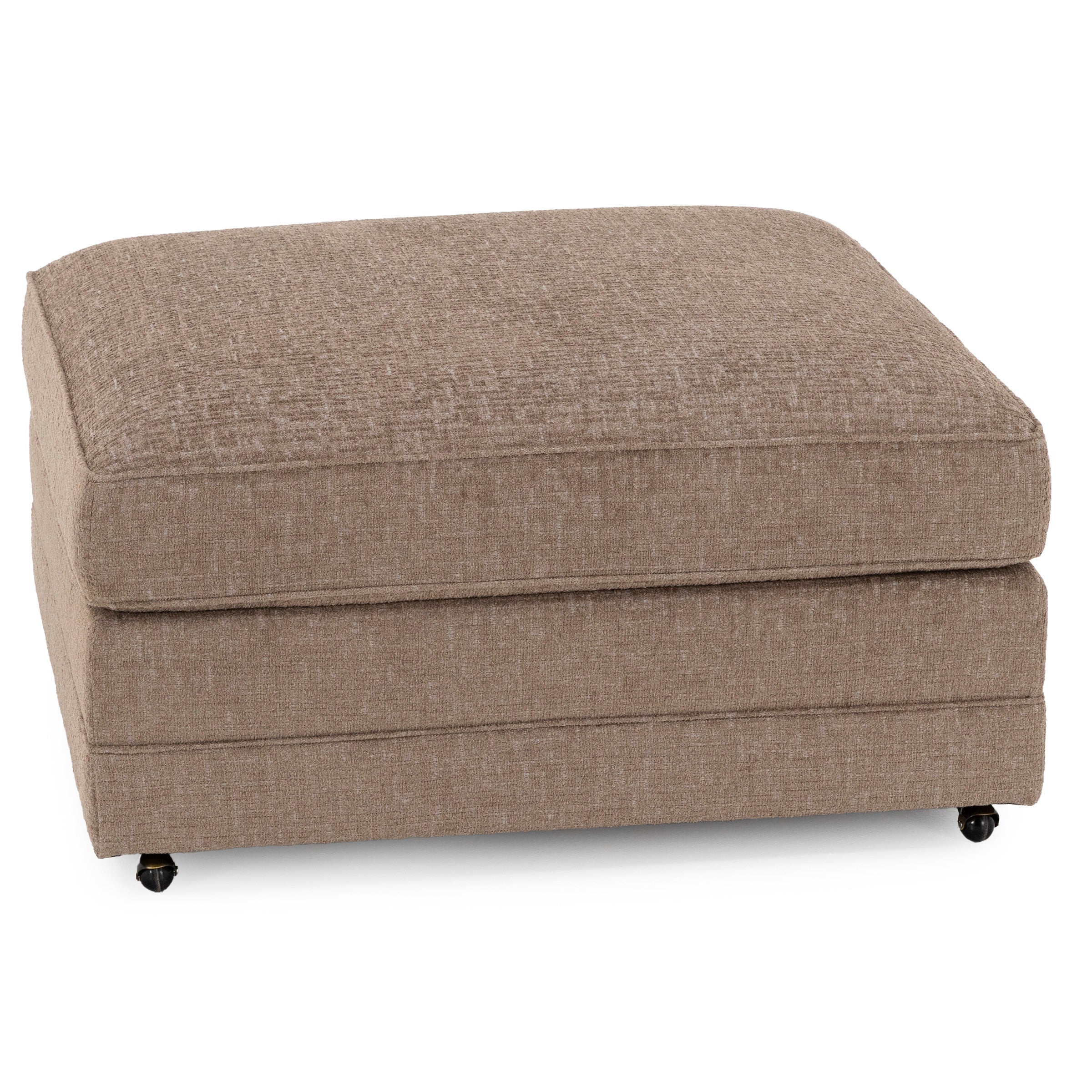 Square upholstered ottoman in light brown fabric, with low casters.