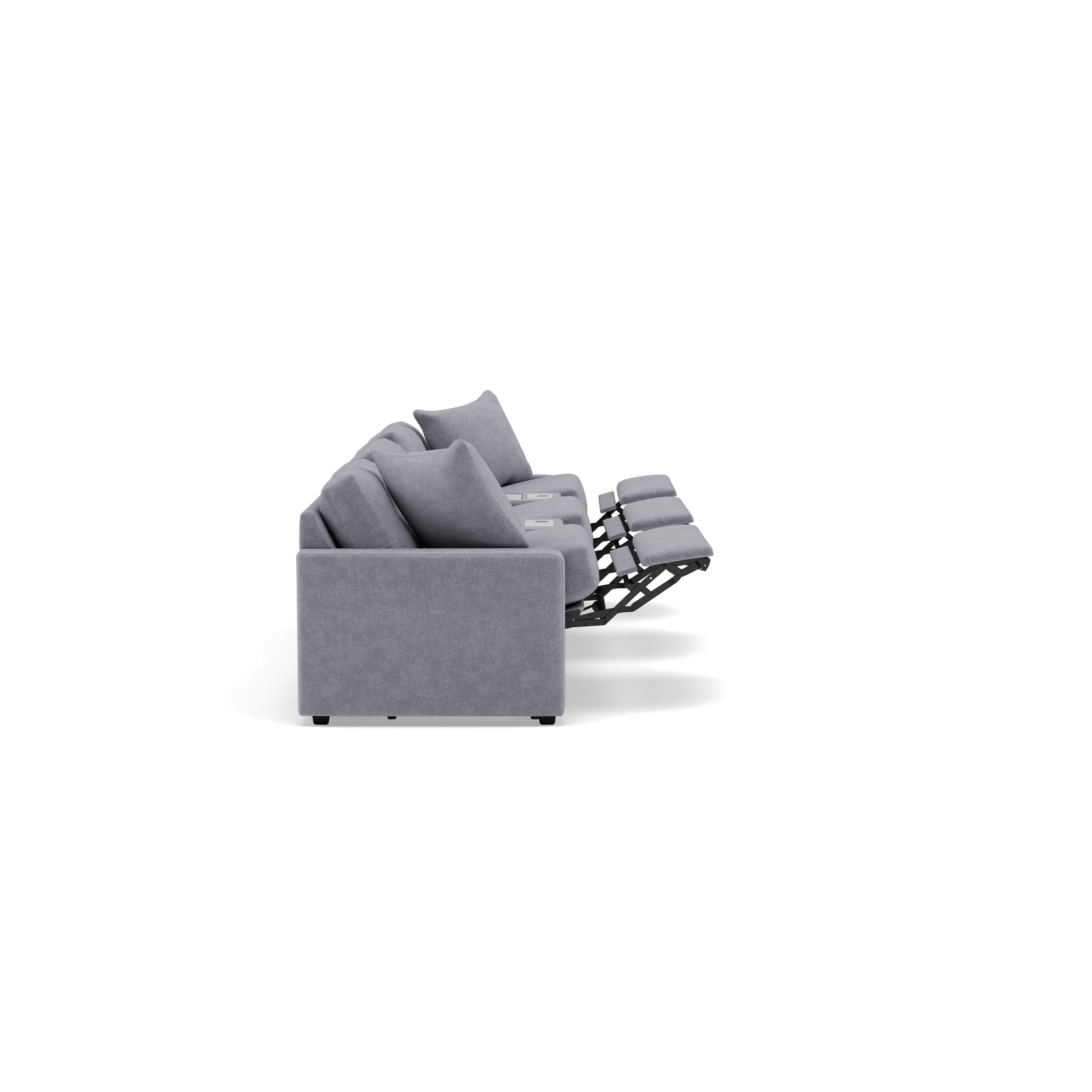 Side view of a gray reclining sofa with extended footrests.