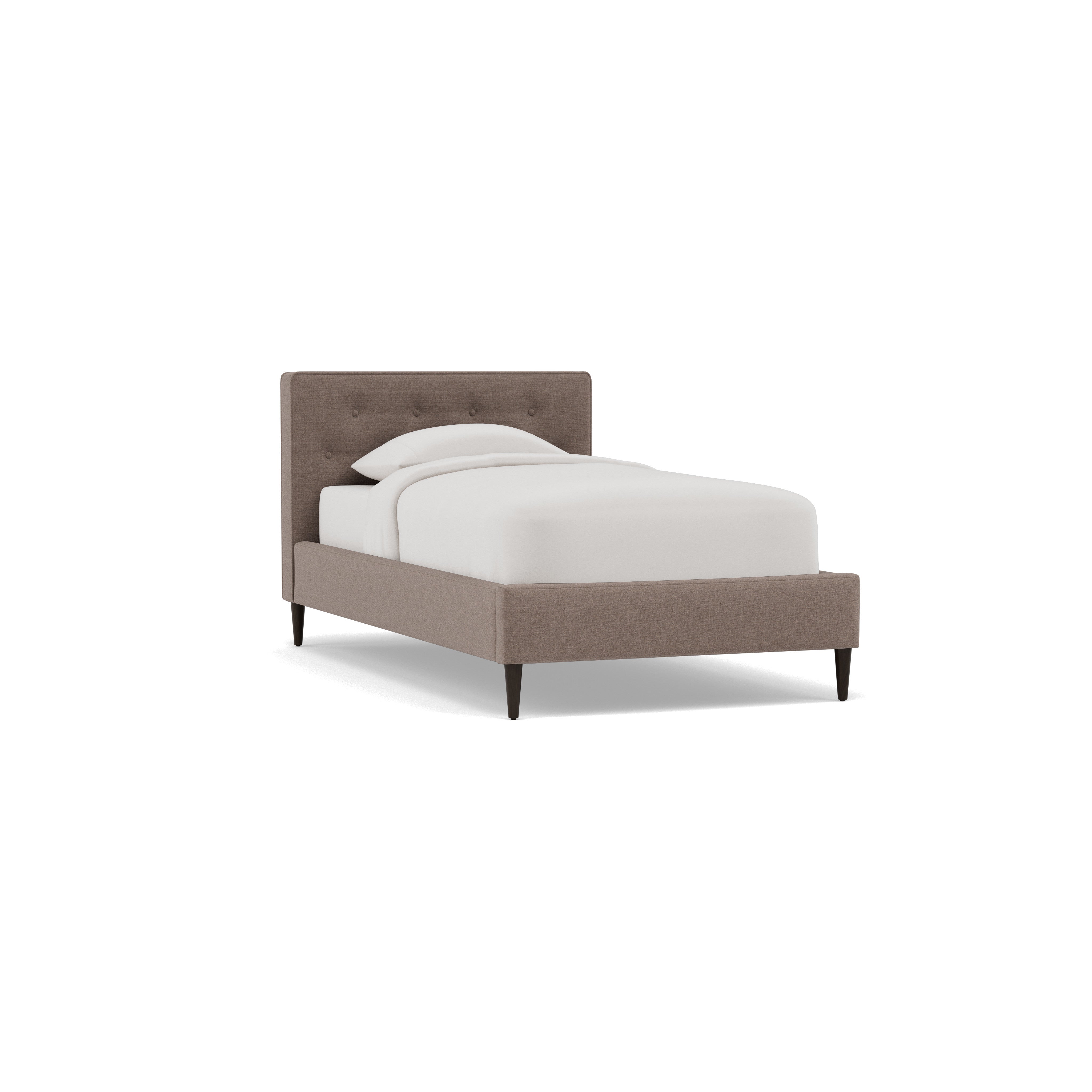 Upholstered bed with tufted headboard and white bedding on wood legs.