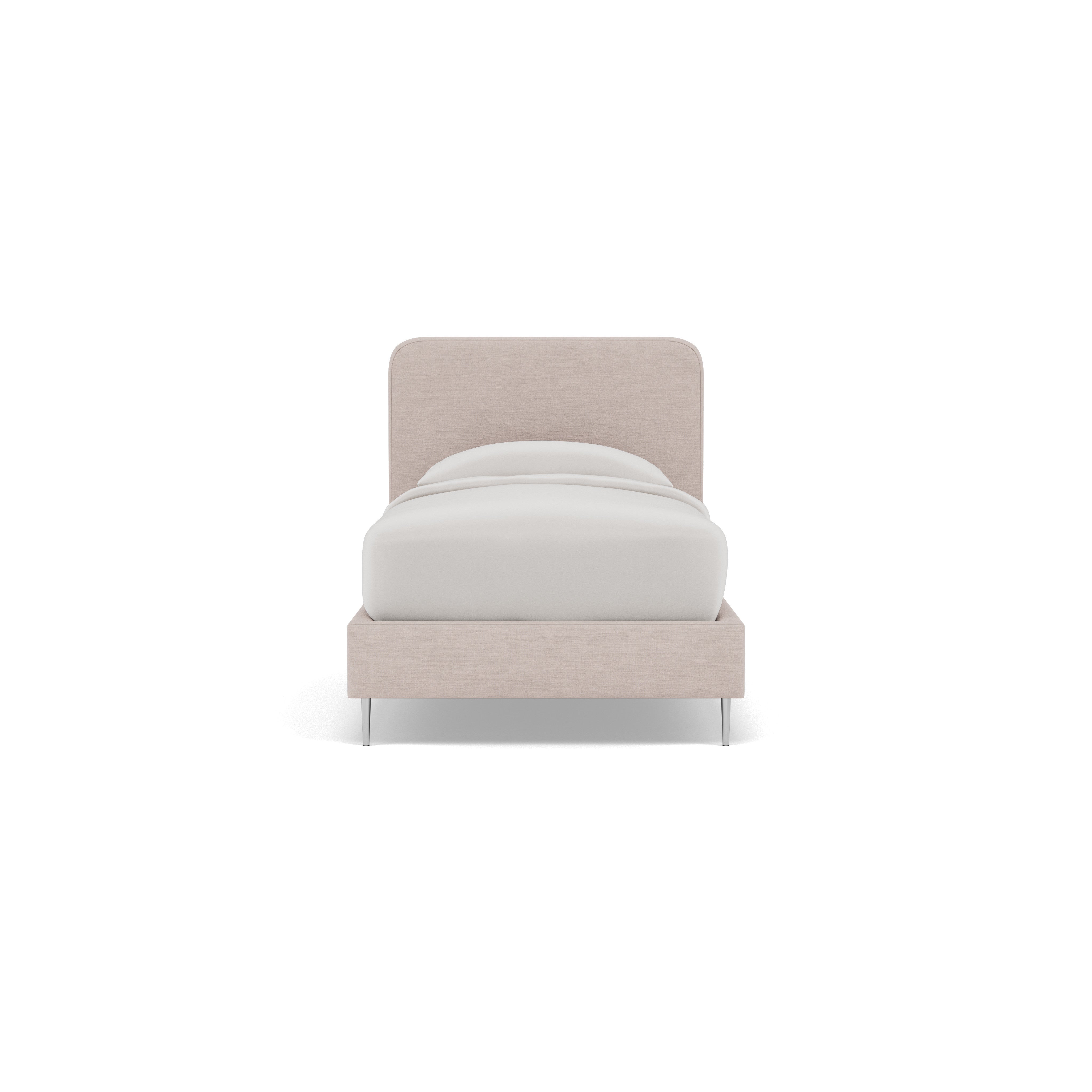 Front view of a twin bed with a beige upholstered headboard and white bedding.