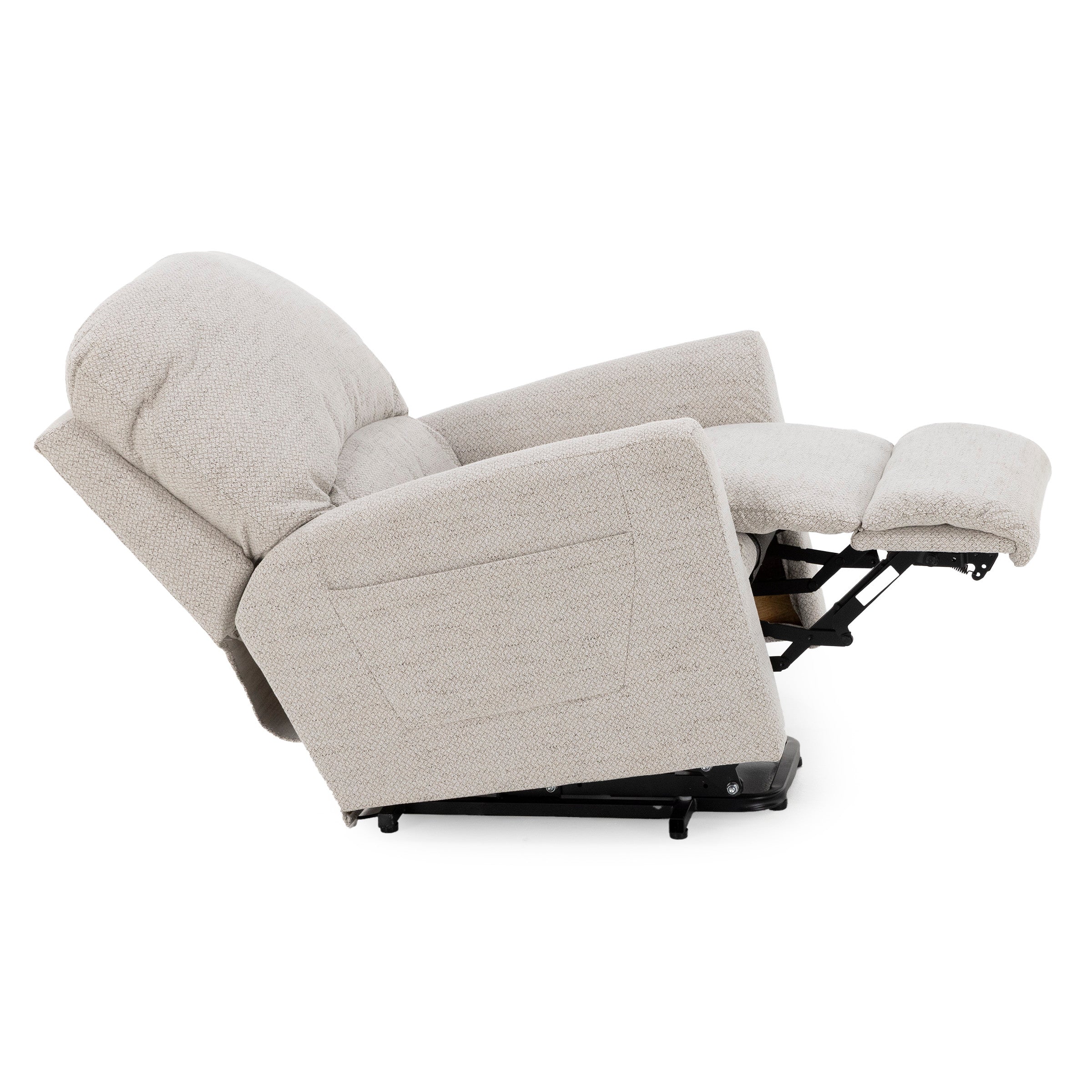 Side view of a beige reclining chair with footrest extended.