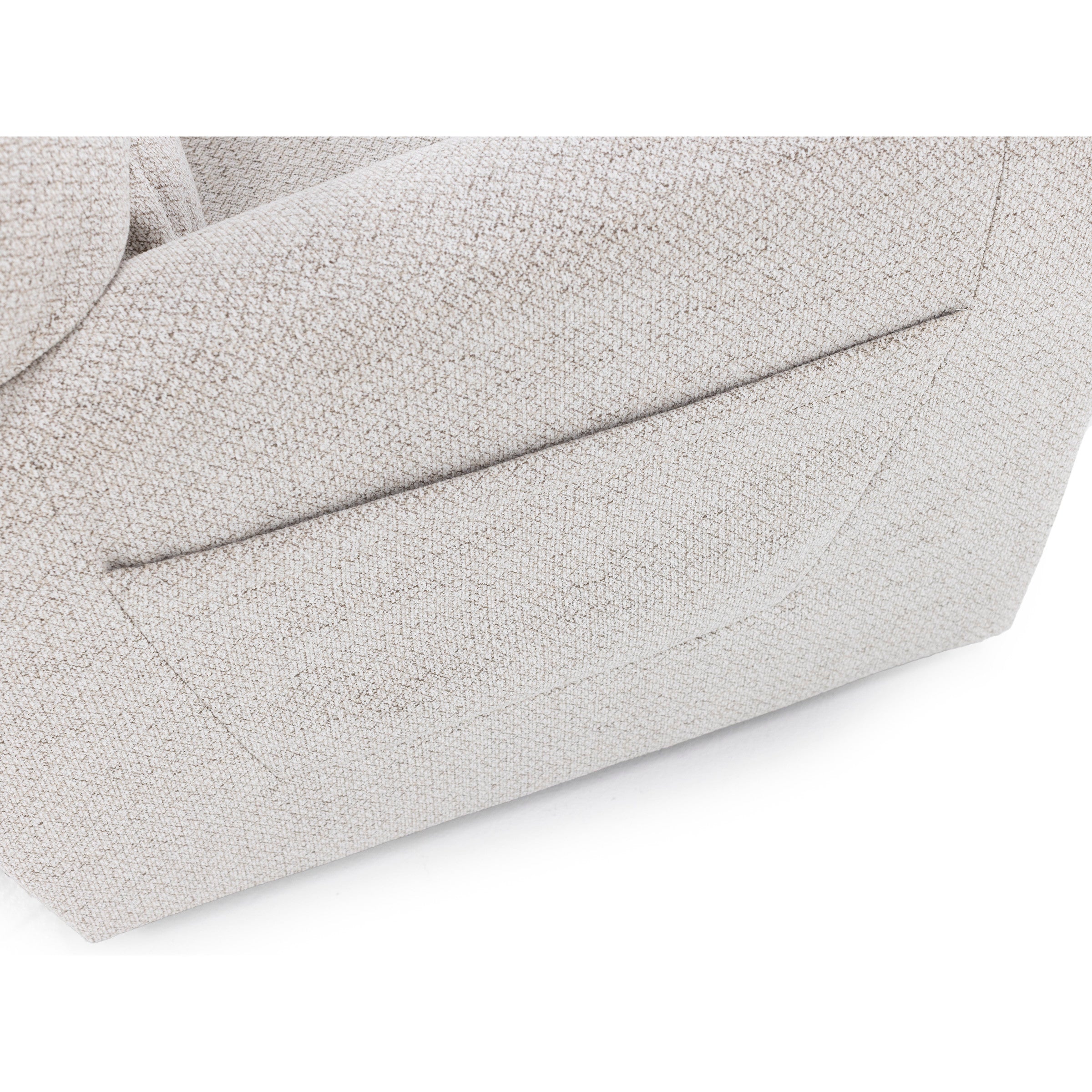 Close-up of a fabric sofa arm with an integrated side pocket.